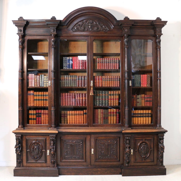 Victorian Carved Oak Elizabethan Revival Breakfront Bookcase by Wylie and Lochhead For Sale at
