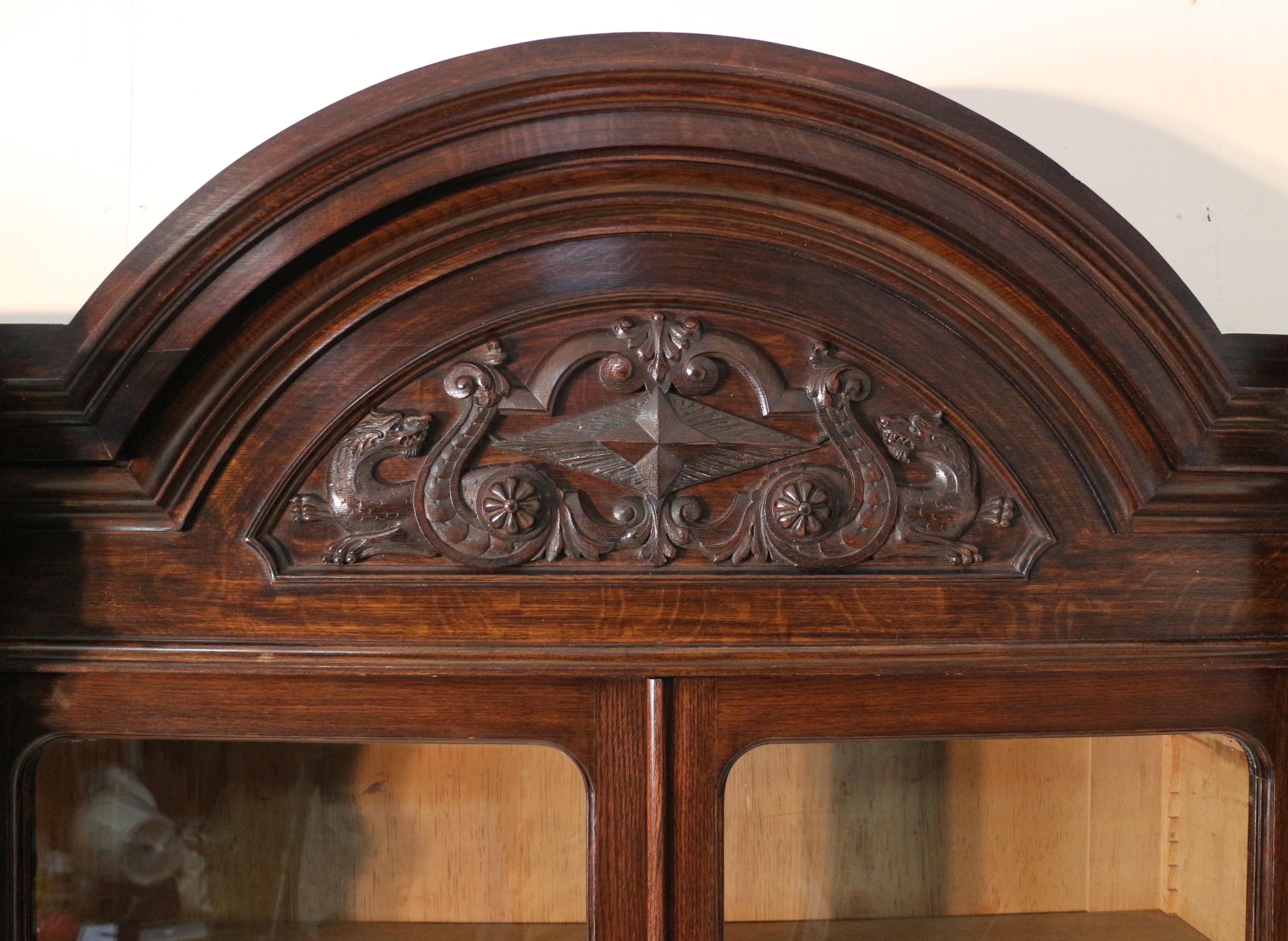 British Victorian Carved Oak Elizabethan Revival Breakfront Bookcase by Wylie & Lochhead