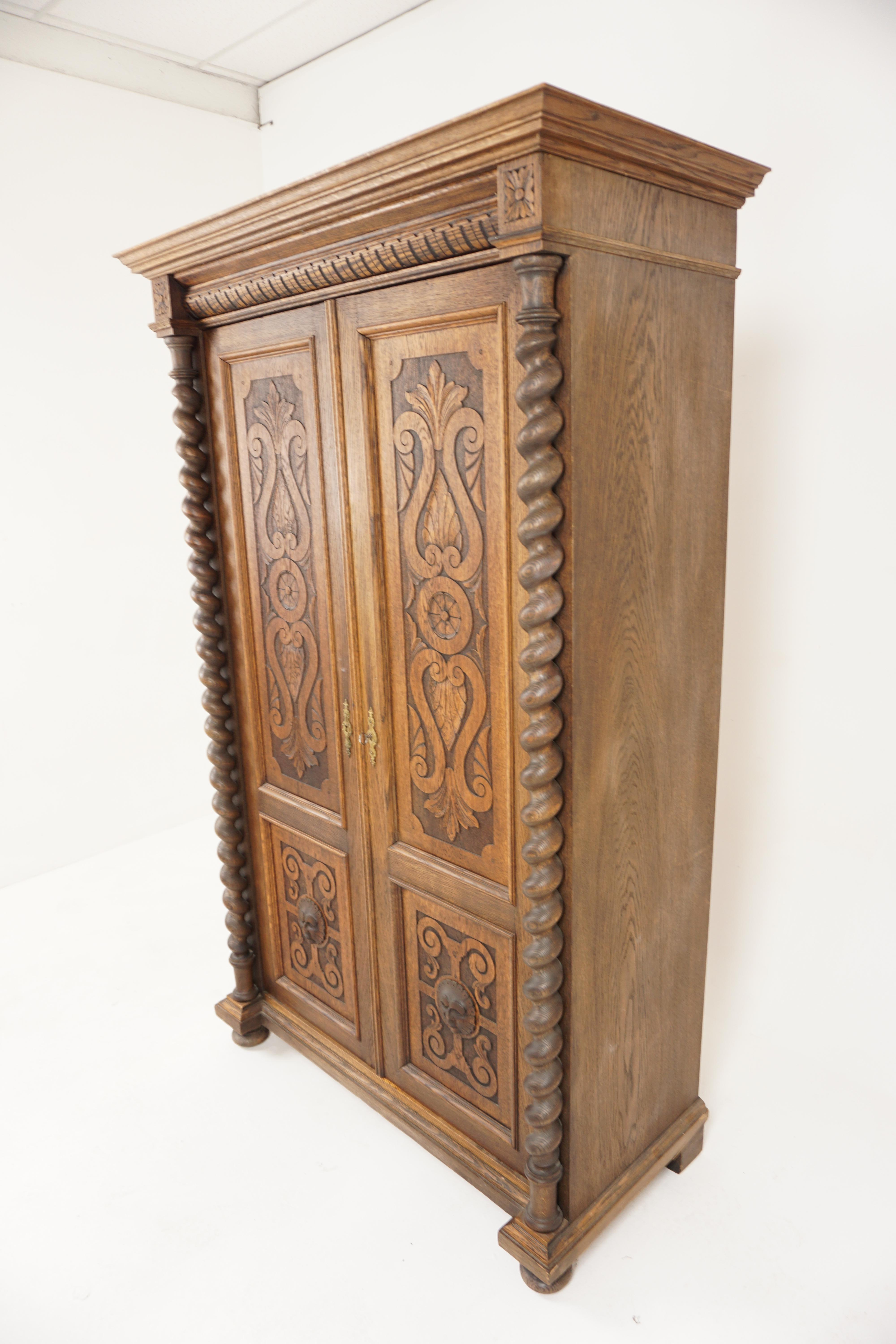 Victorian Carved Oak Hall Robe Barley Twist Closet Fitted Interior, Scotland 1880, H1172

Scotland 1880
Solid Oak
Original Finish
With projecting moulded cornice on top
Carved frieze underneath
With tow carved panelled doors with scrolling