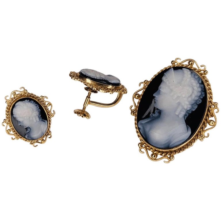 Beautiful Antique, Finely detailed Victorian Revival Onyx Cameo Earrings and Pendant/Brooch, Hand carved Cameos are set in hand crafted 14 Karat yellow Gold surrounds. Set weighs approx. 15.7gm. This pendant/brooch and matching earrings epitomizes