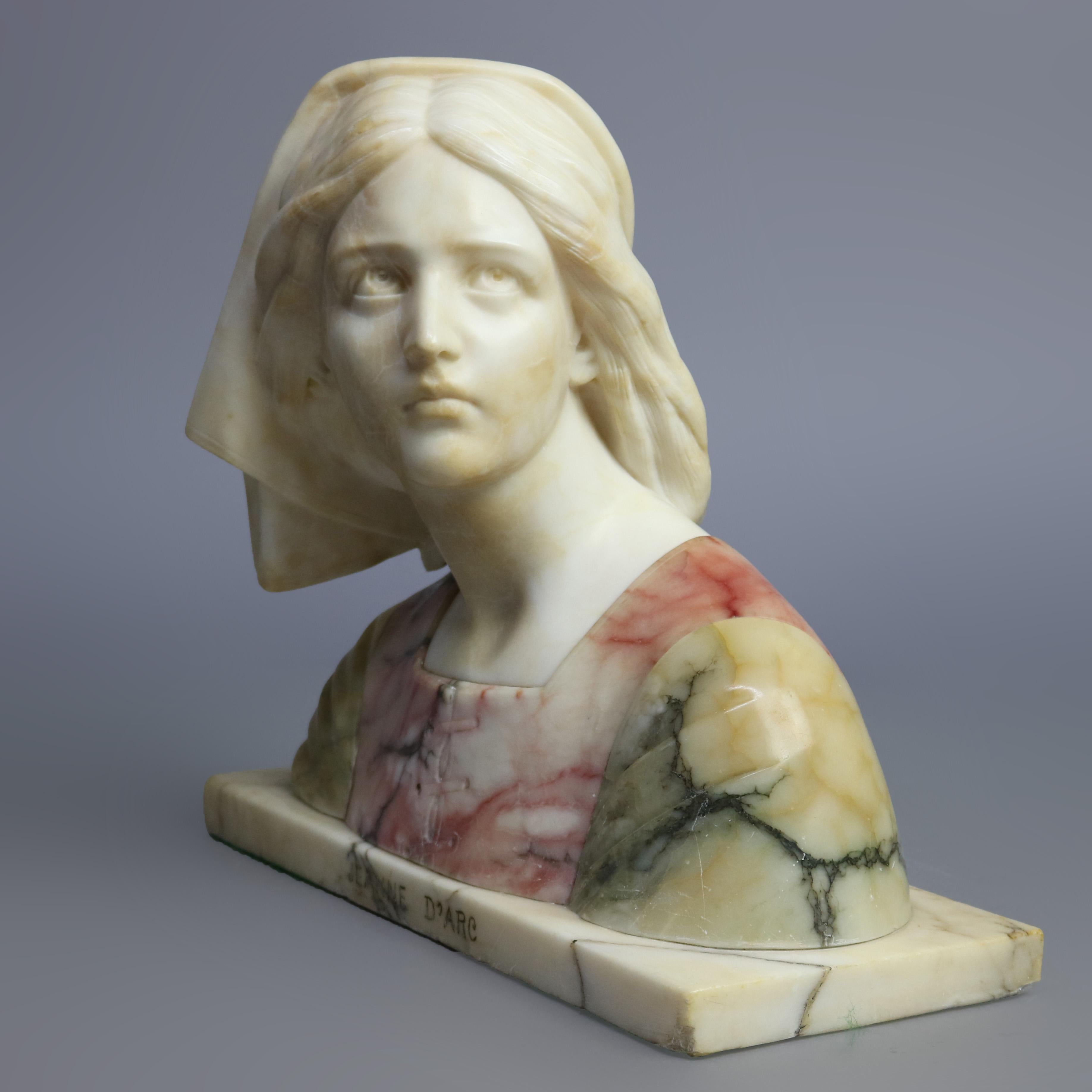 An antique Victorian carved polychrome Italian marble bust depicts Jeanne D' Arc, titled such on base front, signed en verso upper right Prof. G. Bessi, circa 1880

Measures: 14