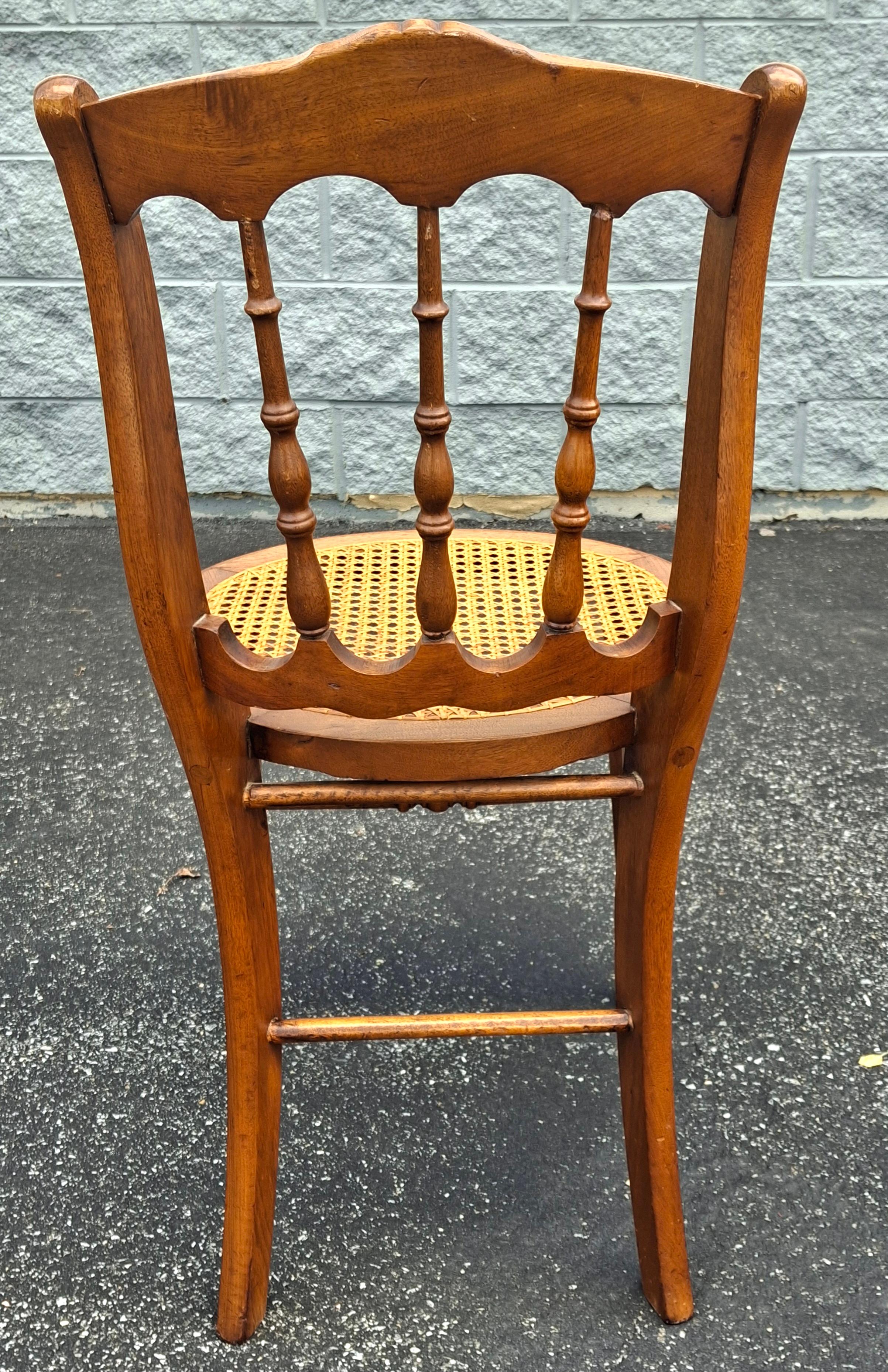 Stained Victorian Carved Walnut and Cane Seat Side Chair For Sale