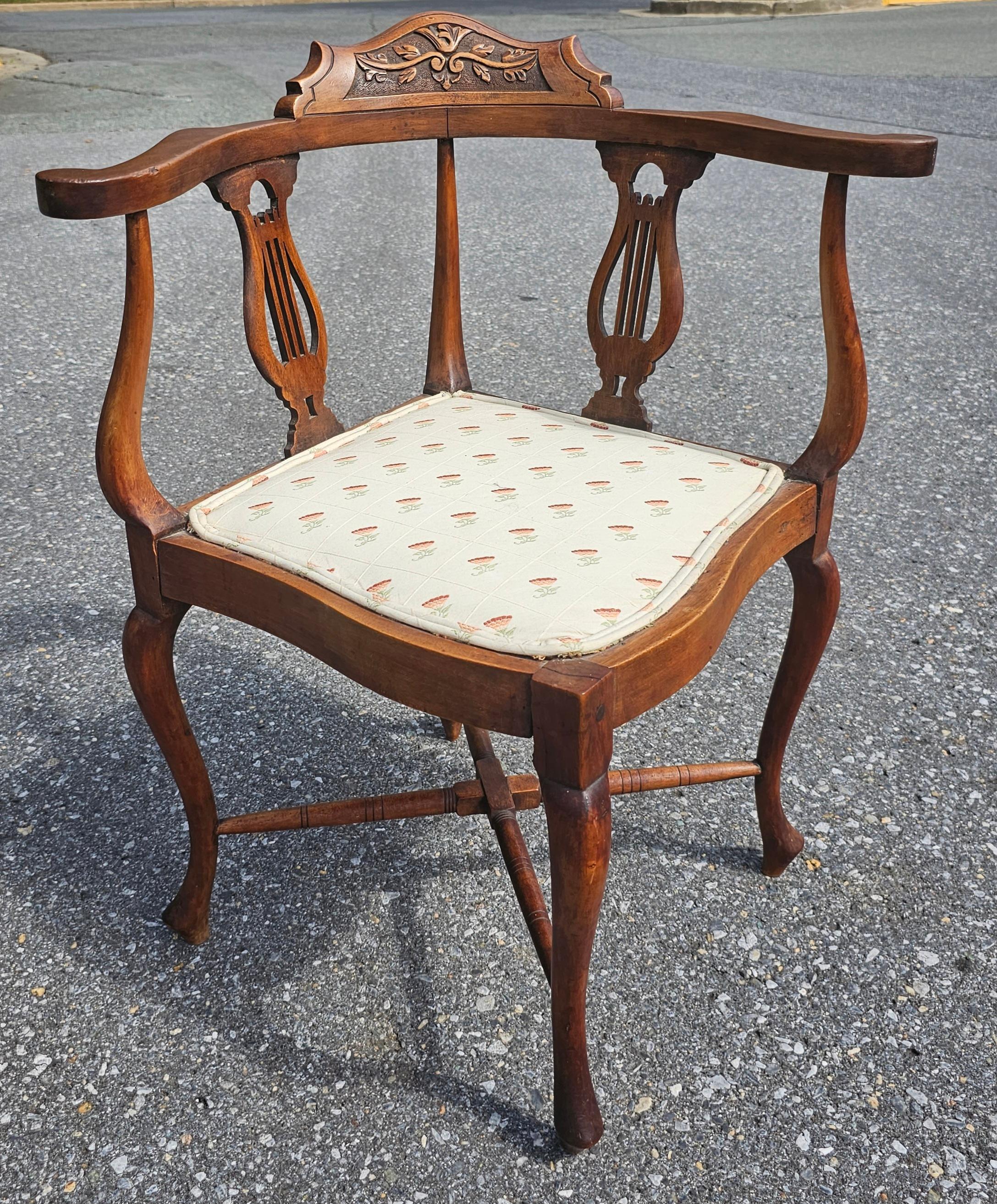 Victorian Carved Walnut Upholstered Seat Corner Chair. Good antique condition. Measures  24.5