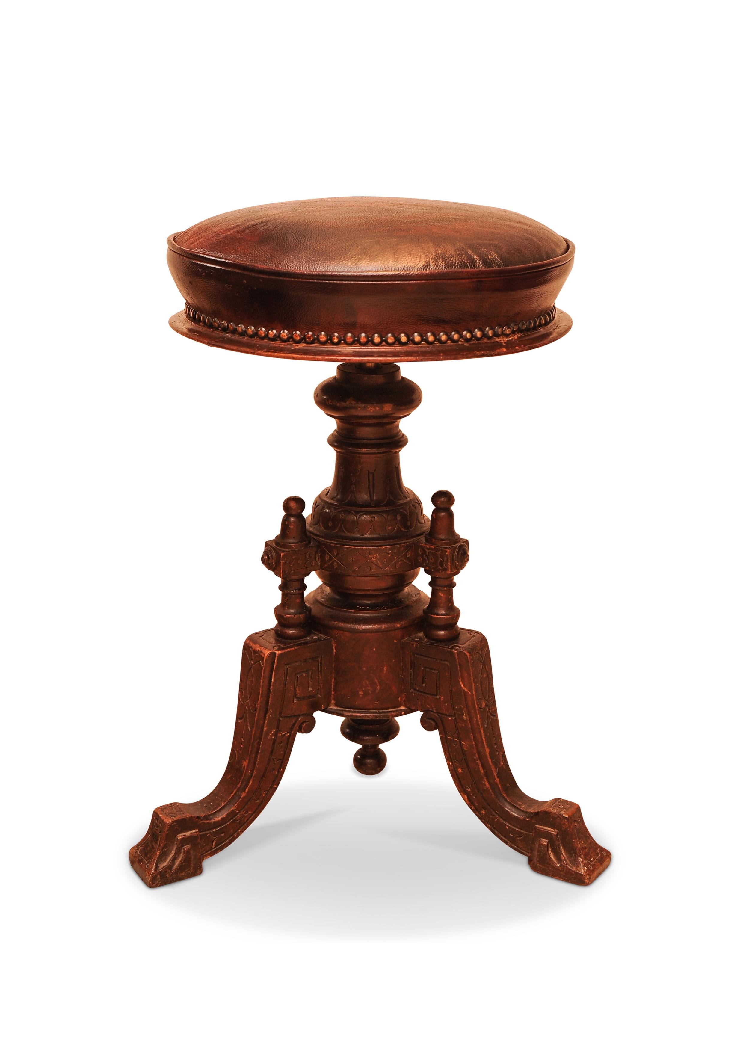 High Victorian Victorian Carved Wood Revolving Piano Stool With Brown Leather Seat Brass Studs For Sale