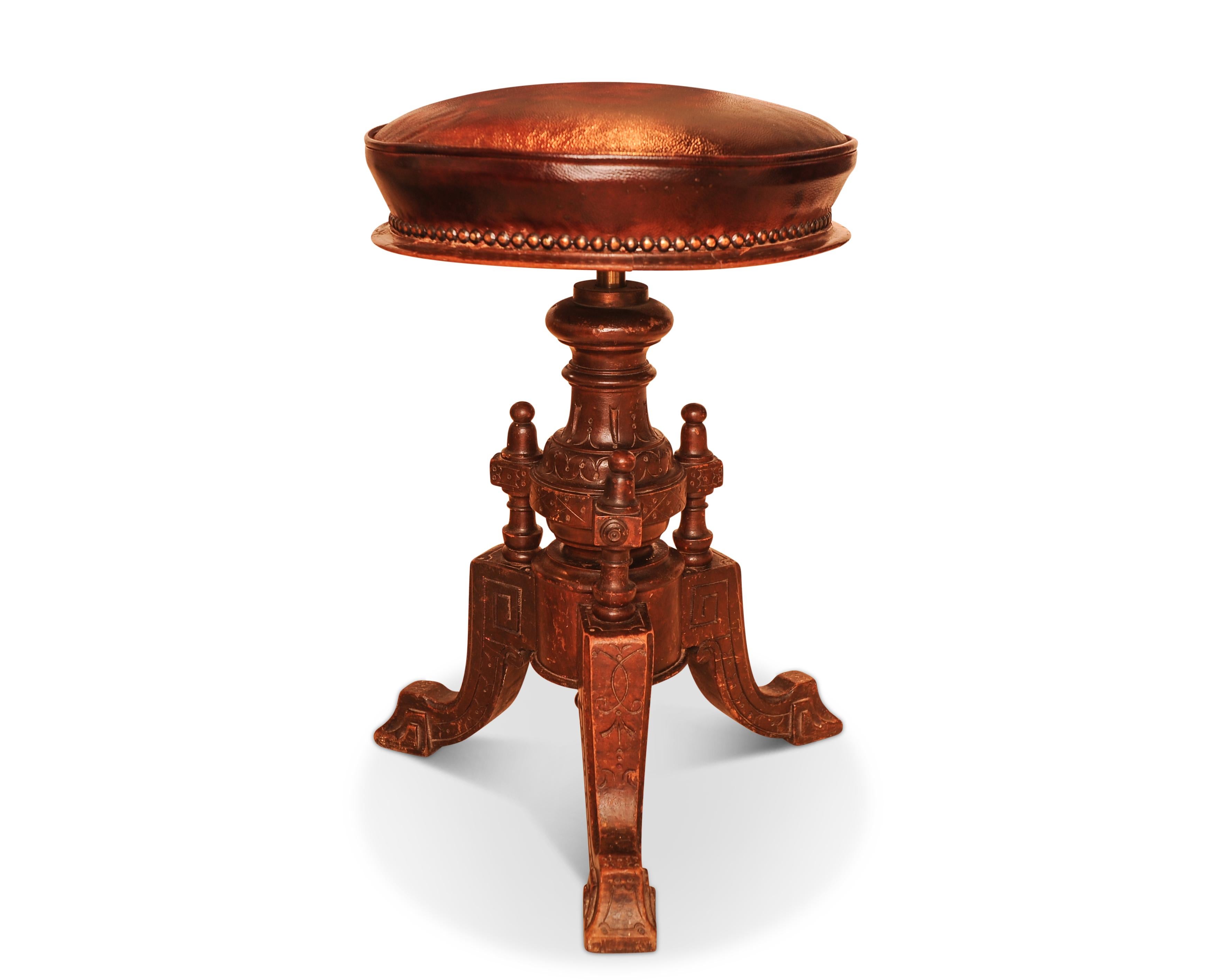 Hand-Crafted Victorian Carved Wood Revolving Piano Stool With Brown Leather Seat Brass Studs For Sale