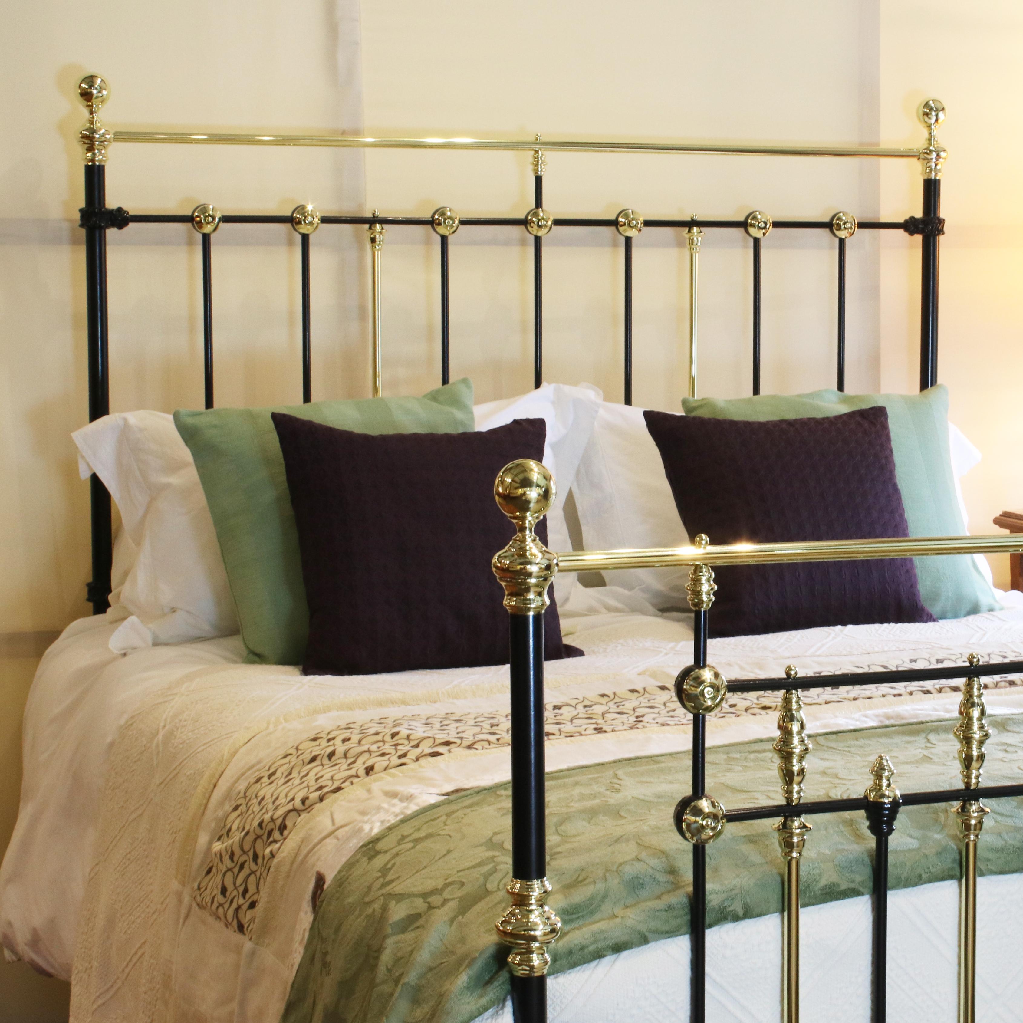 Fine example of a quality Victorian cast iron and brass bed, finished in black with brass ring and rosette decoration.

This bed accepts a British King Size or American Queen Size (5ft wide, 60 inches or 150cm) base and mattress set.

The price