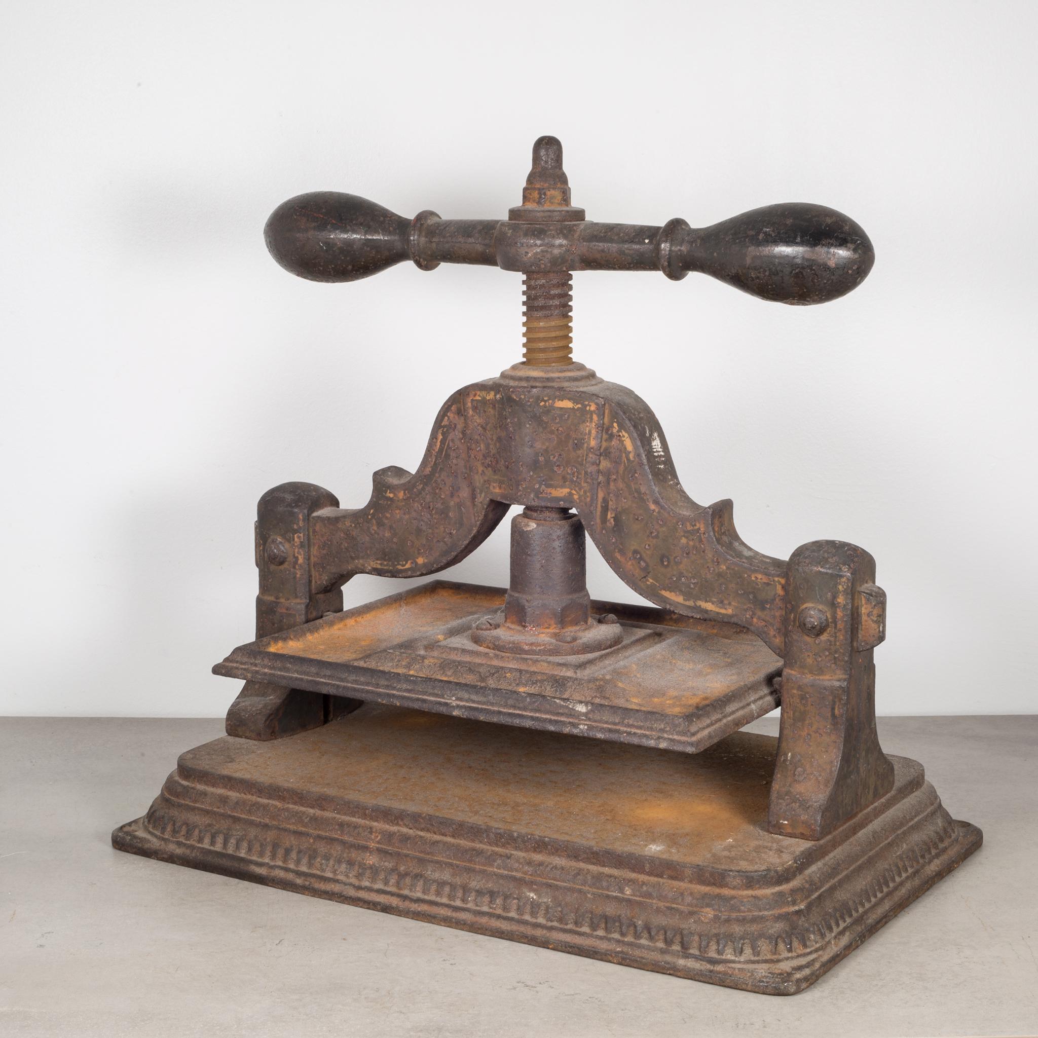 About:

This is an antique cast iron ball turn bar book press. The handle works properly and moves up and down. The press has retained some of the original stenciling on the body and is structurally sound.

Creator: Unknown.
Date of