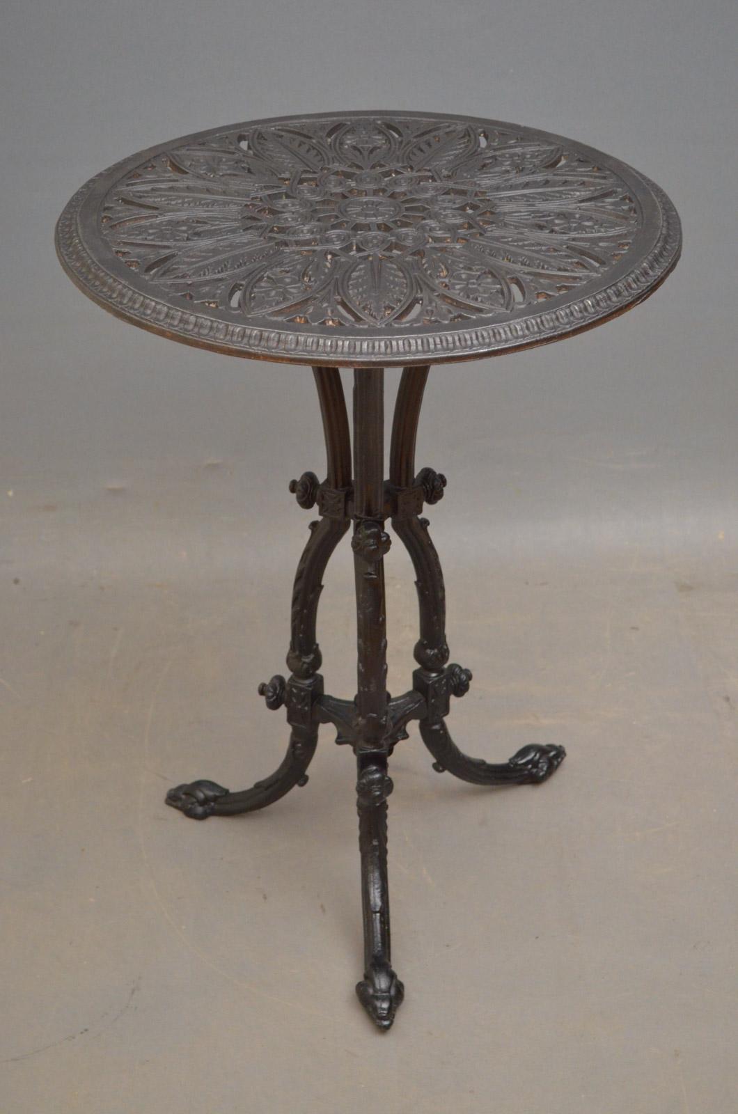 Sn4538 Victorian cast iron garden table, having fretwork top supported on 3 shaped uprights terminating in pad feet. This table is in fantastic condition throughout - ready to place at home, garden or conservatory, circa 1880
Measures: Height 27