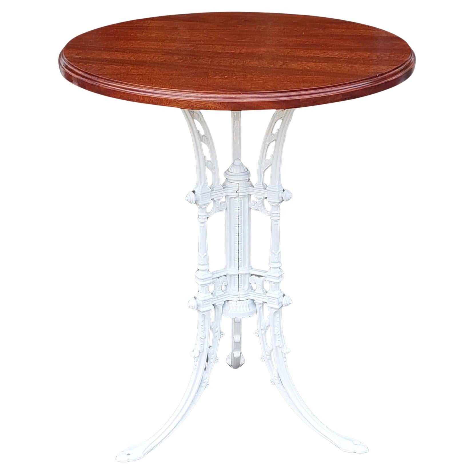 Mesa de jardín victoriana de hierro fundido