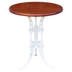 Mesa de jardín victoriana de hierro fundido
