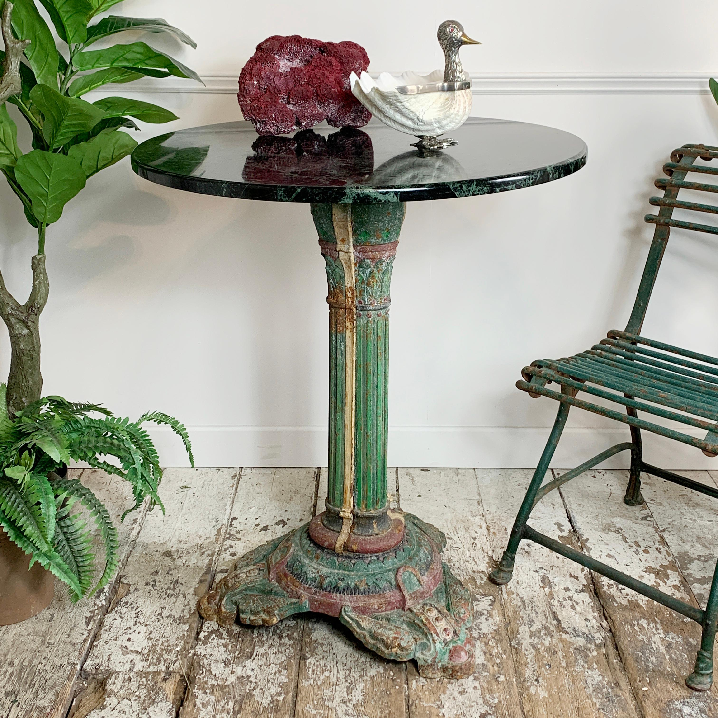 A stunning Victorian table, the legs are cast iron and bear the original paint, the gorgeous green Italian Marble top is a later addition, and it works superbly with the decorative and ornate base.

Measures: Height 80cm x Width 68cm x Depth