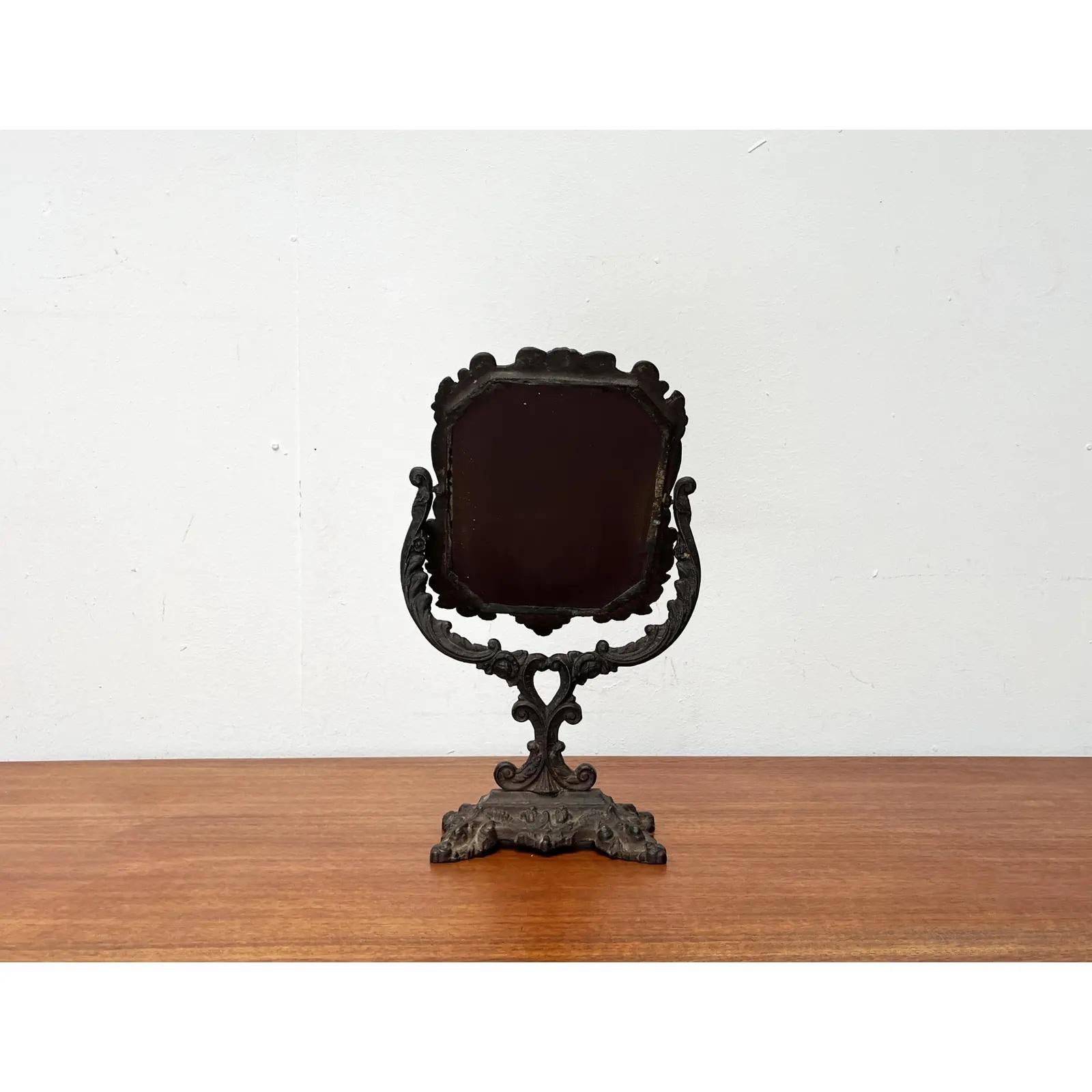 Victorian Cast Iron Table Mirror, 1900s, in Very Good conditions. Designed 1890 to 1919.

Additional information:
Material: Metal
Color: Gray
Item Type: Vintage, Antique or Pre-owned
Diamension: 9.45ʺW × 4.33ʺD × 16.14ʺH
Condition: Unknown, Some