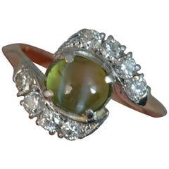 Antique Victorian Cats Eye Chrysoberyl and Diamond 18 Carat Rose Gold Twist Cluster Ring