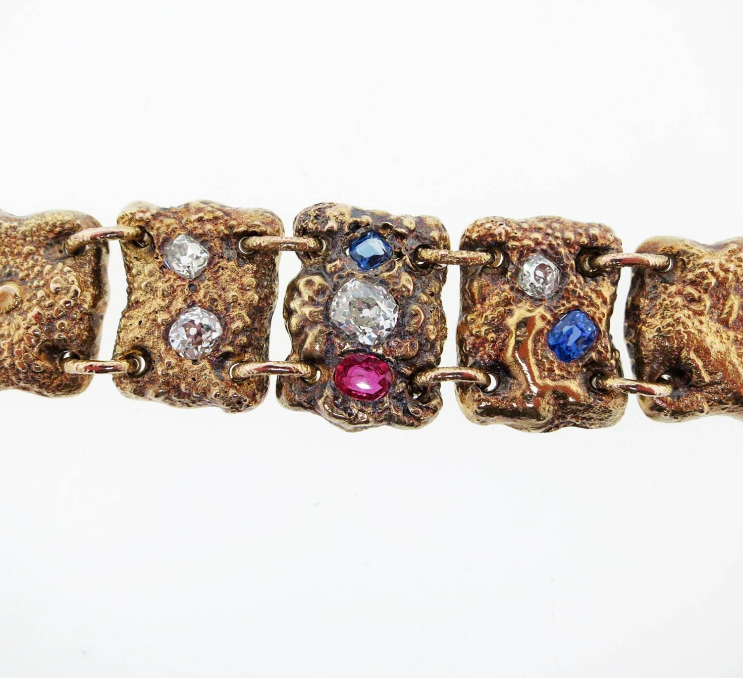 American made patriotic 14kt. yellow gold link bracelet to commemorate the Declaration of Independence  1776. The bracelet is set with four old mine cut diamonds totaling approx 1.30cts., two natural blue sapphires and one natural ruby. The bracelet