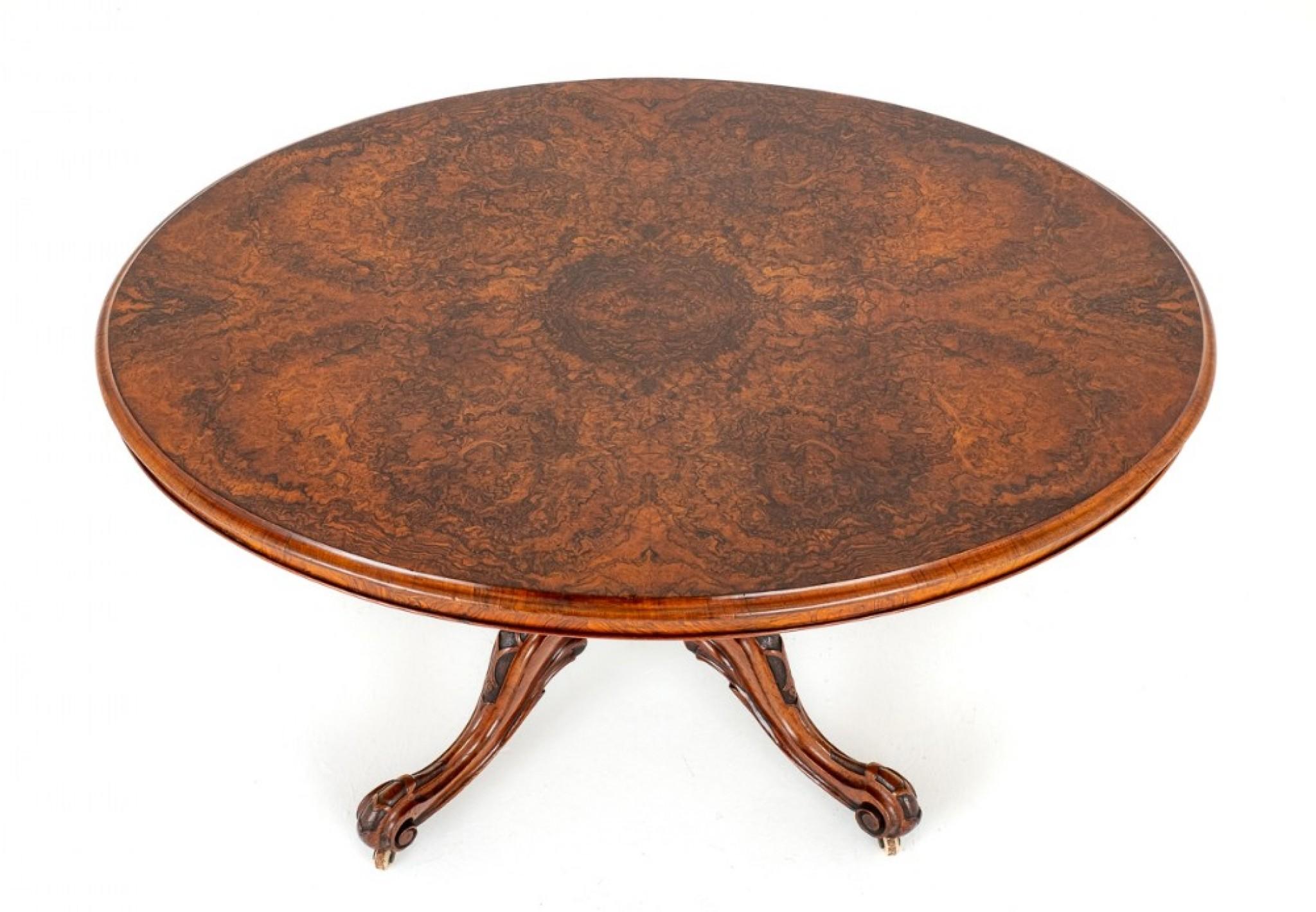 Victorian Burr Walnut Oval Centre Table.
The Top of the Table Having the Most Wonderful Burr Walnut Veneers Complete with Thumb Moldings.
The Base of the Table Featuring a Turned and Carved Column, Swept and Carved Legs Terminating with Brass