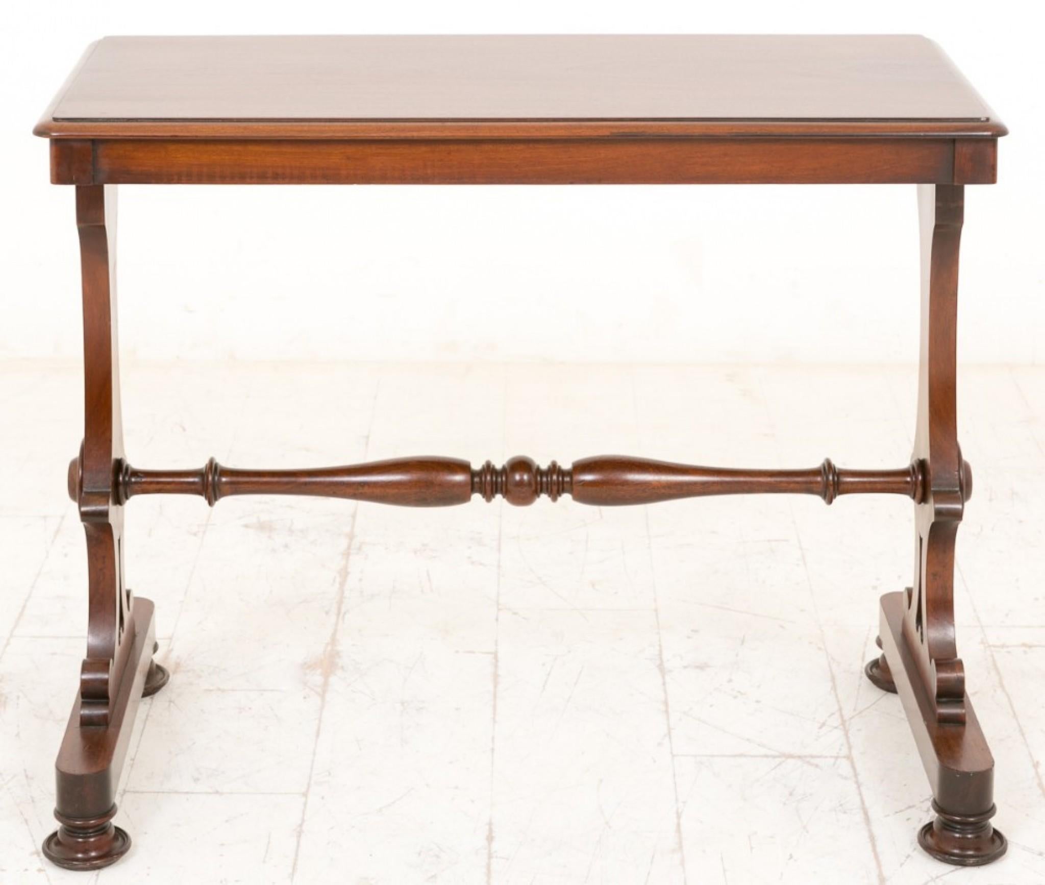 Early Victorian Centre Table.
Circa 1850
Standing on turned bun feet with stylised end supports and a ring turned stretcher rail.
The top featuring nice quality timbers.