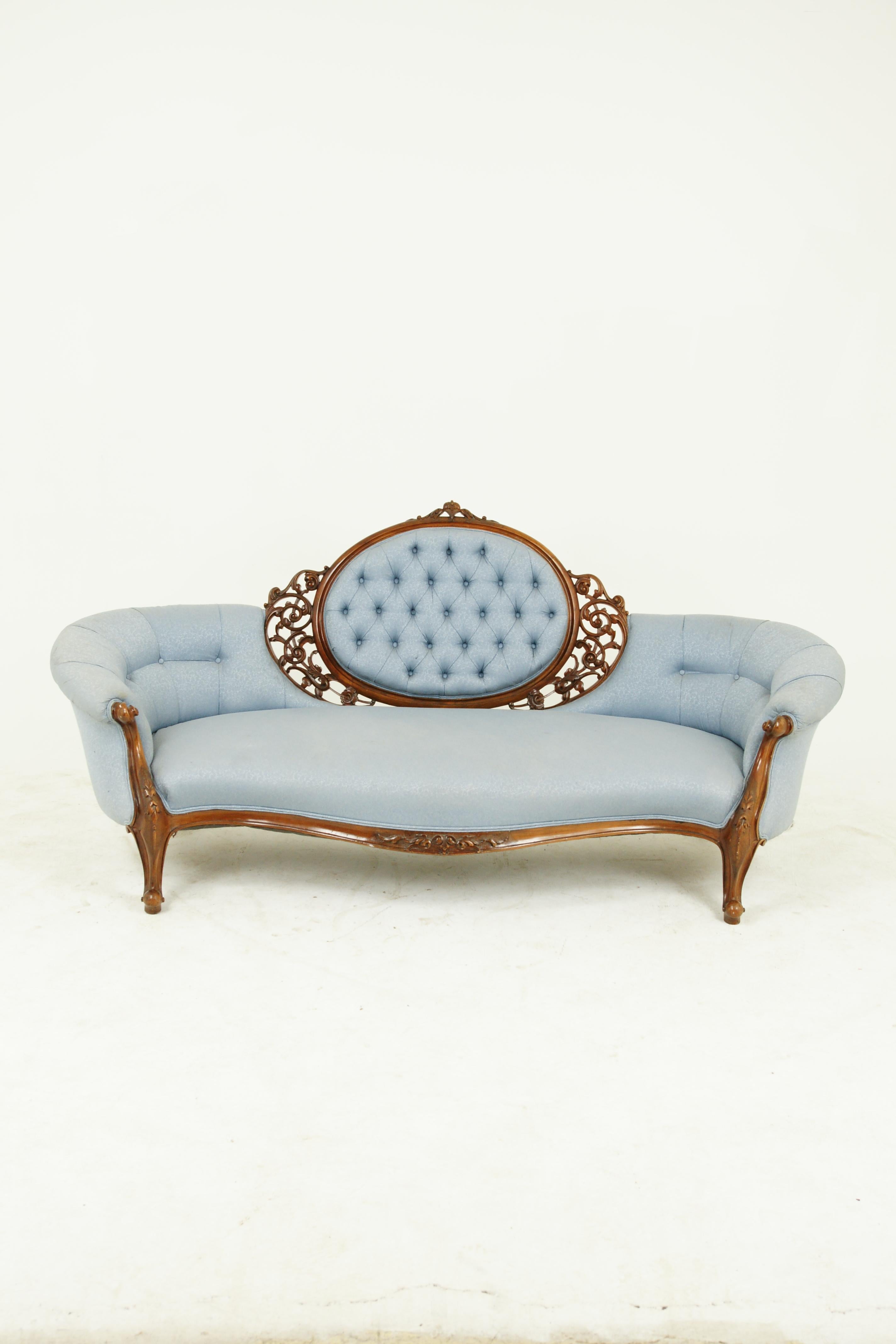 Antique chaise lounge, Victorian loveseat, vintage settee, Scotland, 1870, Antique Furniture, B1528

Scotland 1870
Solid walnut
Oval upholstered black
Ornate carvings to either side
Serpentine front frame ornately carved with flowers
Ornately carved