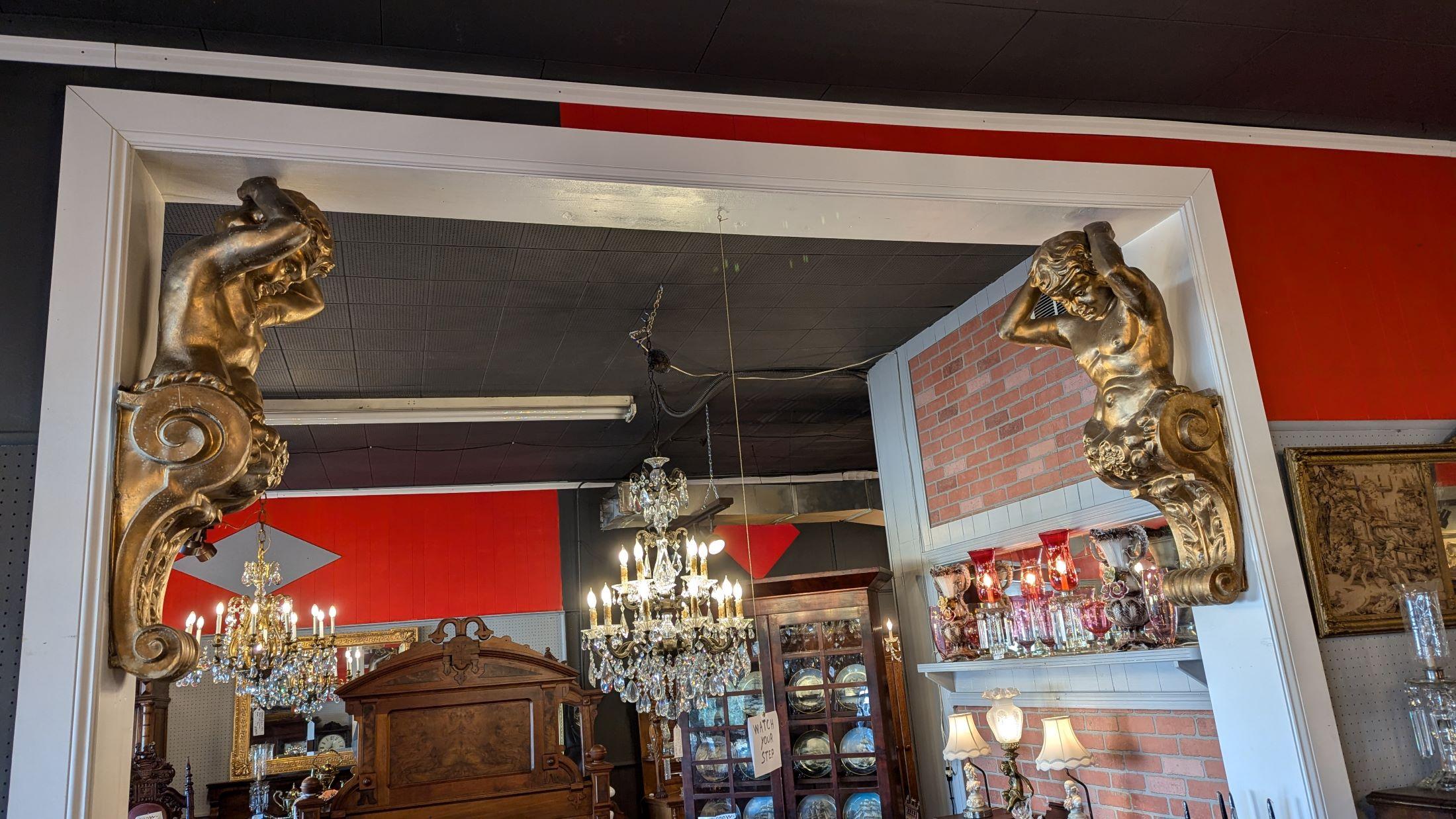 Victorian pressed tin cherub corbel pair.  Absolutely stunning construction, these 150 year old embellishments are held in place by a wooden bracket that attaches to the wall - bracket is 12
