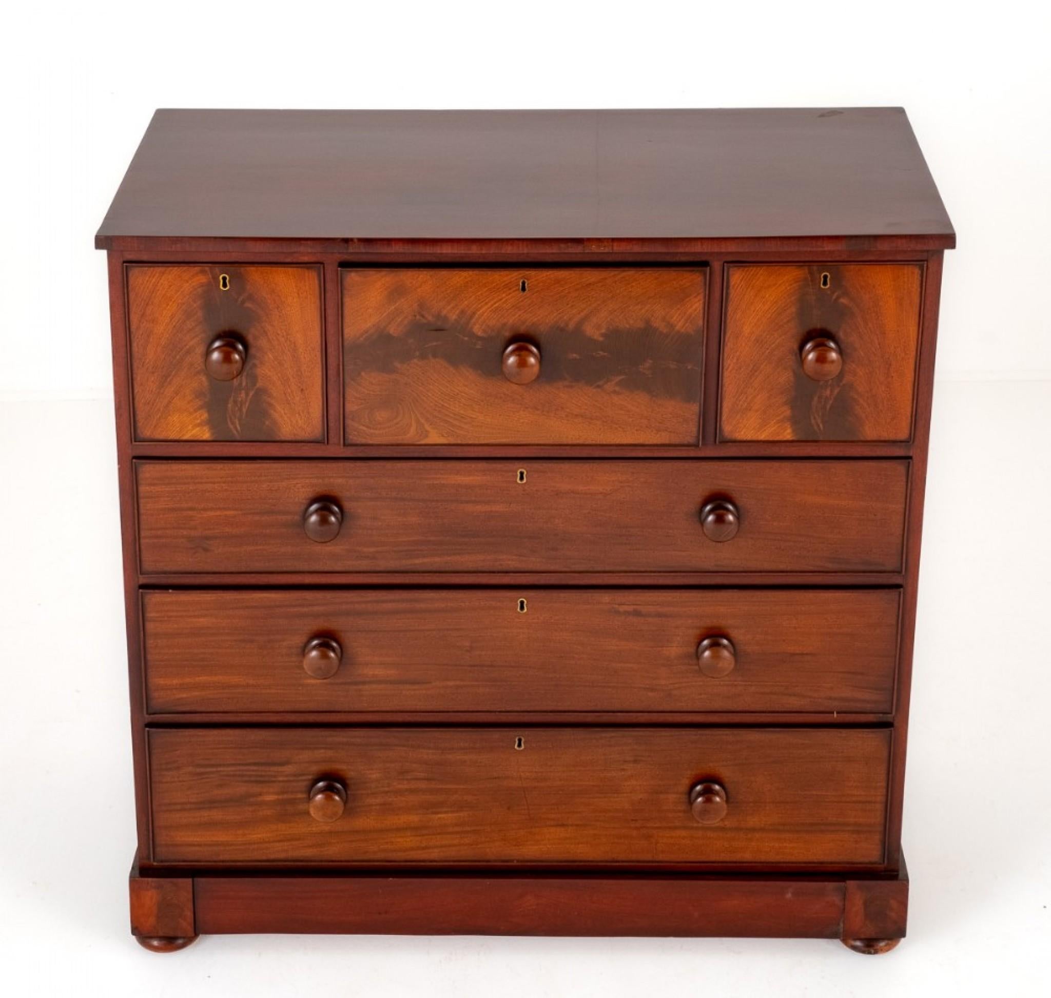 Victorian Mahogany Chest of Drawers.
This Chest of Drawers Features 6 Ash Lined Drawers with Turned Knobs.
The Top 3 Drawers Having Decorative Timbers.
Circa 1860
An Extra Feature of This Piece is a Secret Drawer Disguised as the Plinth