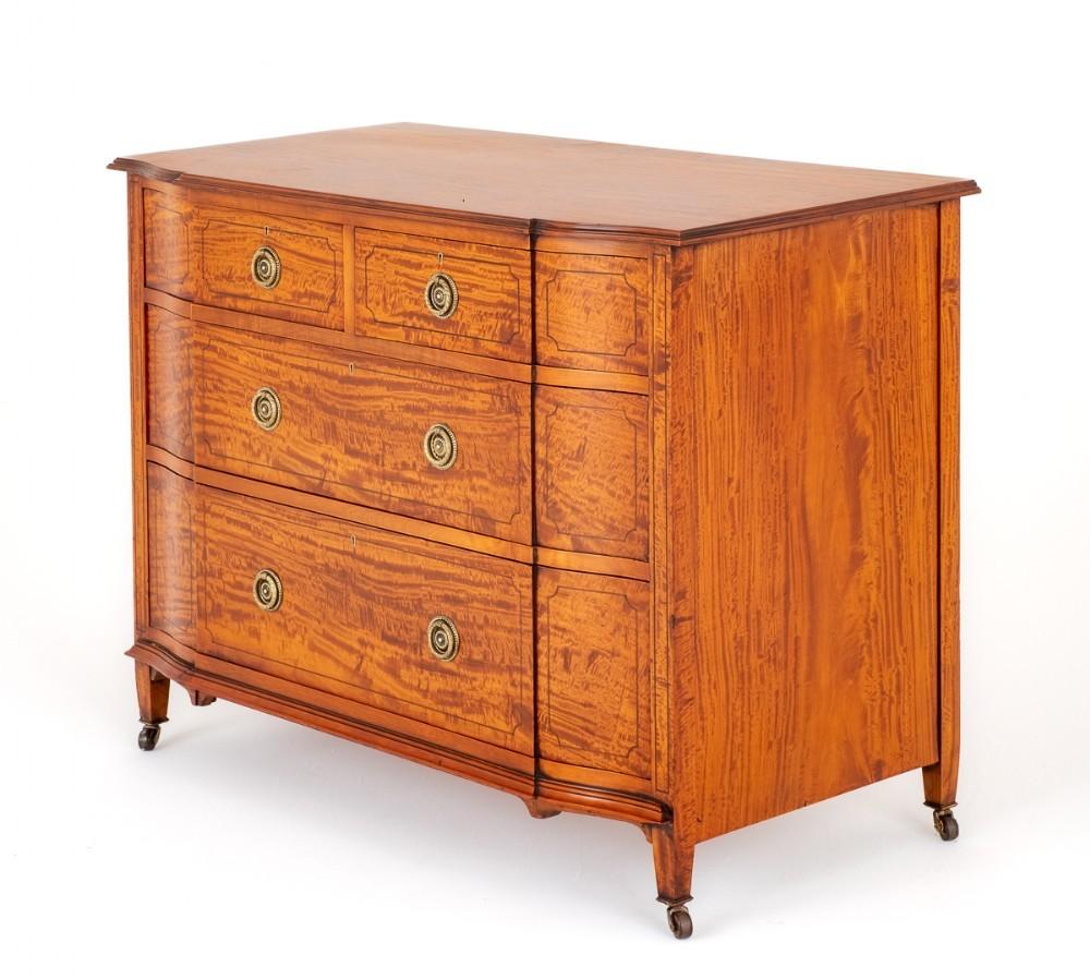 Stunning satinwood chest of drawers.
This Satinwood Chest Features 4 Graduated Mahogany Lined Shaped Drawers (note the fine dovetails)
circa 1880
Each Drawer Featuring Ebony Line Inlays and Original Brass Ring Pull Handles.
The Chest of Drawers