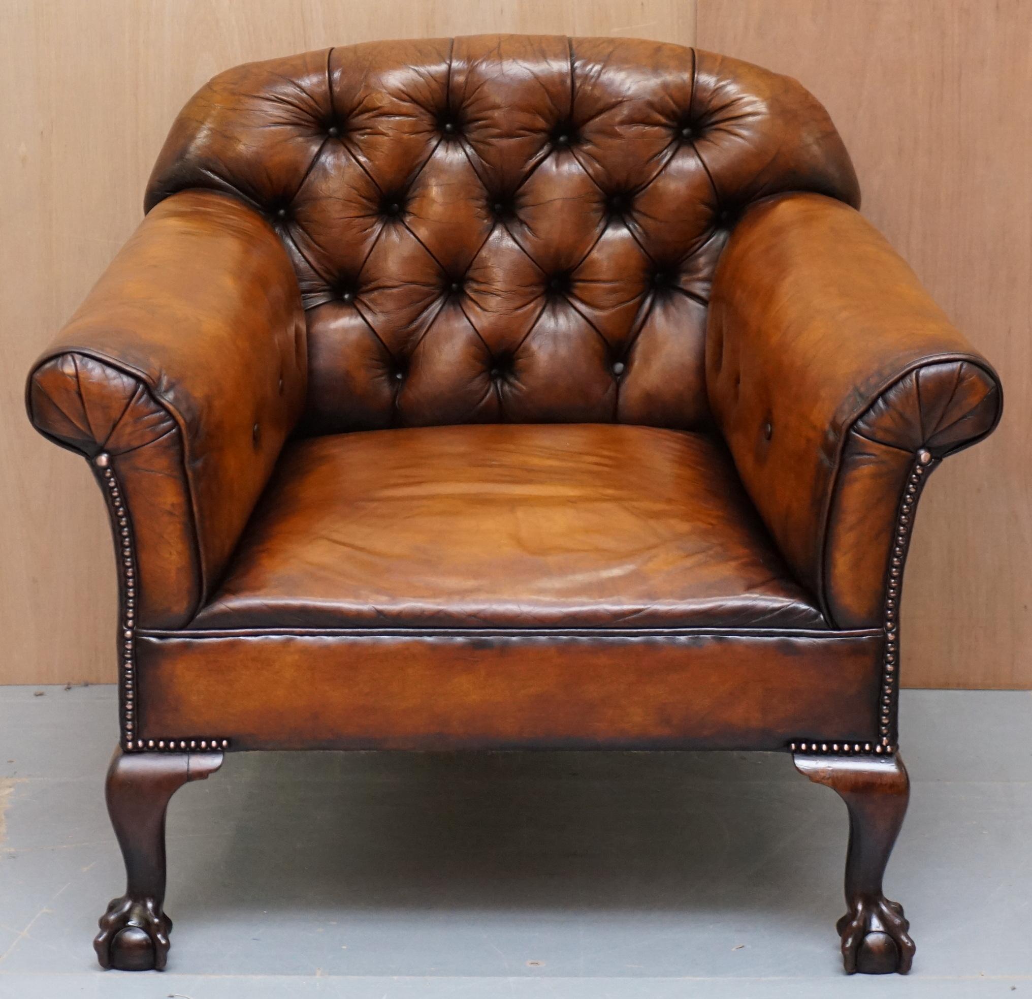 We are delighted to offer for sale this stunning original fully restored hand dyed Whisky brown leather club armchair with hand carved Claw & ball feet

A very rare and desirable piece of exceptionally quality, this chair is fully coil sprung all