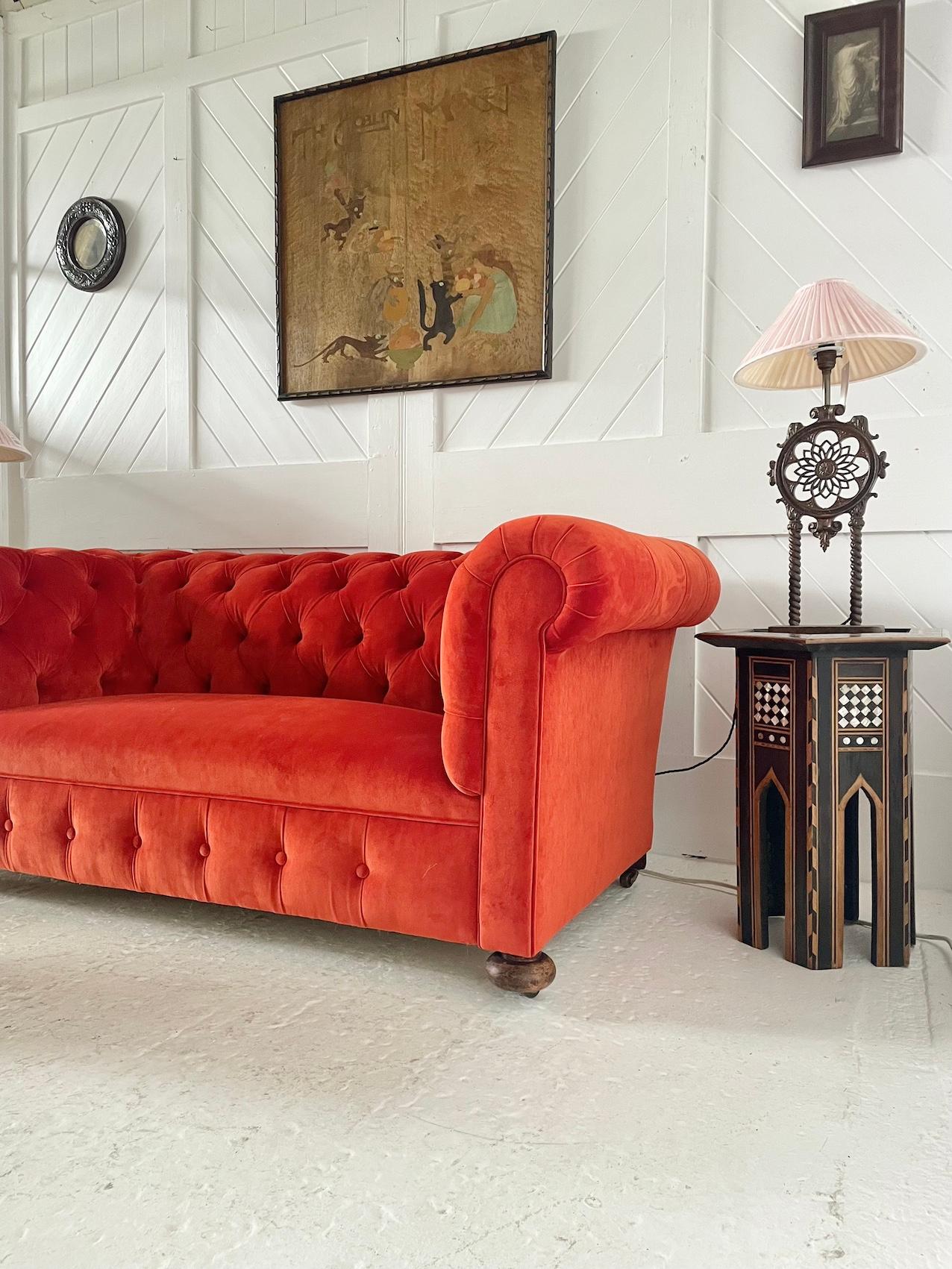Victorian Chesterfield settee

Button back

Set on bun feet

Traditionally re-upholstered

Recovered in orange velvet fabric

Circa 1890

Height 69cm. Width 182cm. Depth 85cm