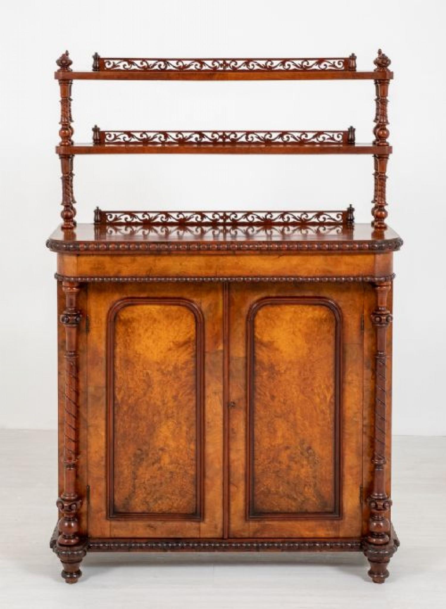 Pretty Victorian Burr walnut chiffonier.
This Elegant Chiffonier Stands Upon Turned Feet.
Having 2 Doors with Wonderful Burr Walnut Veneers Flanked by Turned and Carved Columns.
circa 1850
The Mouldings on the Chiffonier are of a half turned