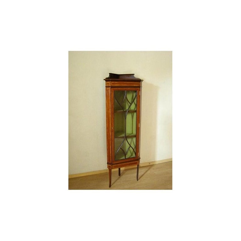 We present beautiful and elegant Corner China Closet from 1890.
The item comes from Vienna, Austria
It has been given a comprehensive manual renovation, cleaned to bare wood, disinfected, covered with high density Shellac polish,
Simplicity and