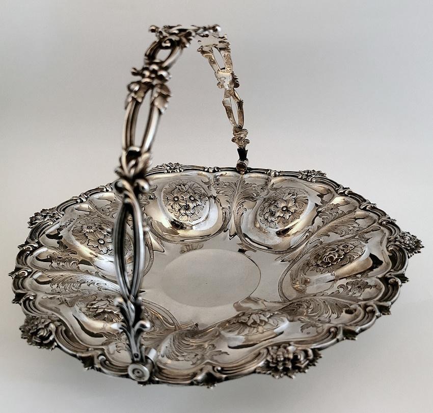 British Victorian Chiseled And Engraved Sterling Silver Basket With Handle For Sale