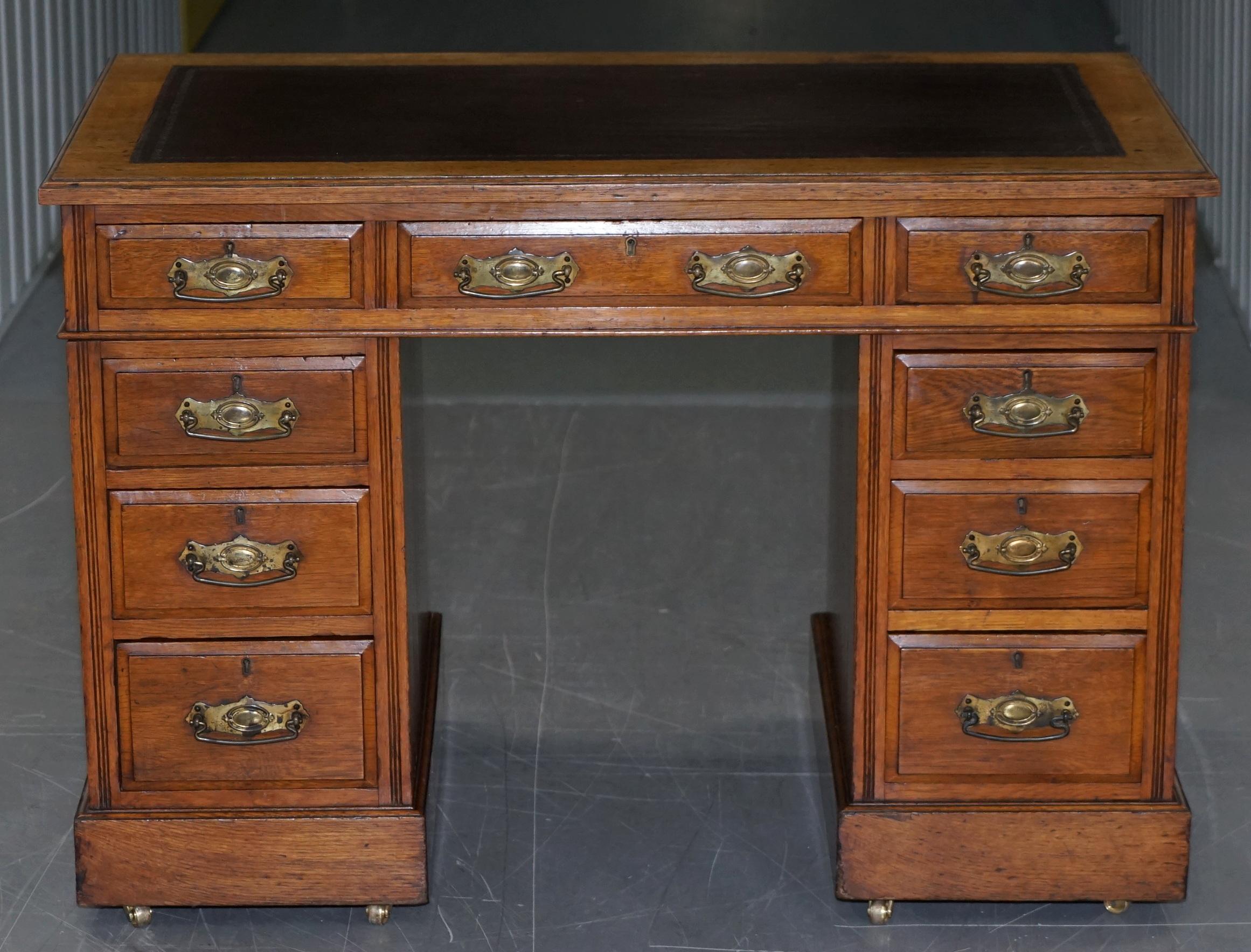 We are delighted to offer for sale this lovely small English oak Victorian circa 1880 twin pedestal partner desk with original fittings and brass castors 

A good looking and compact desk in period lightly restored condition throughout. The desk