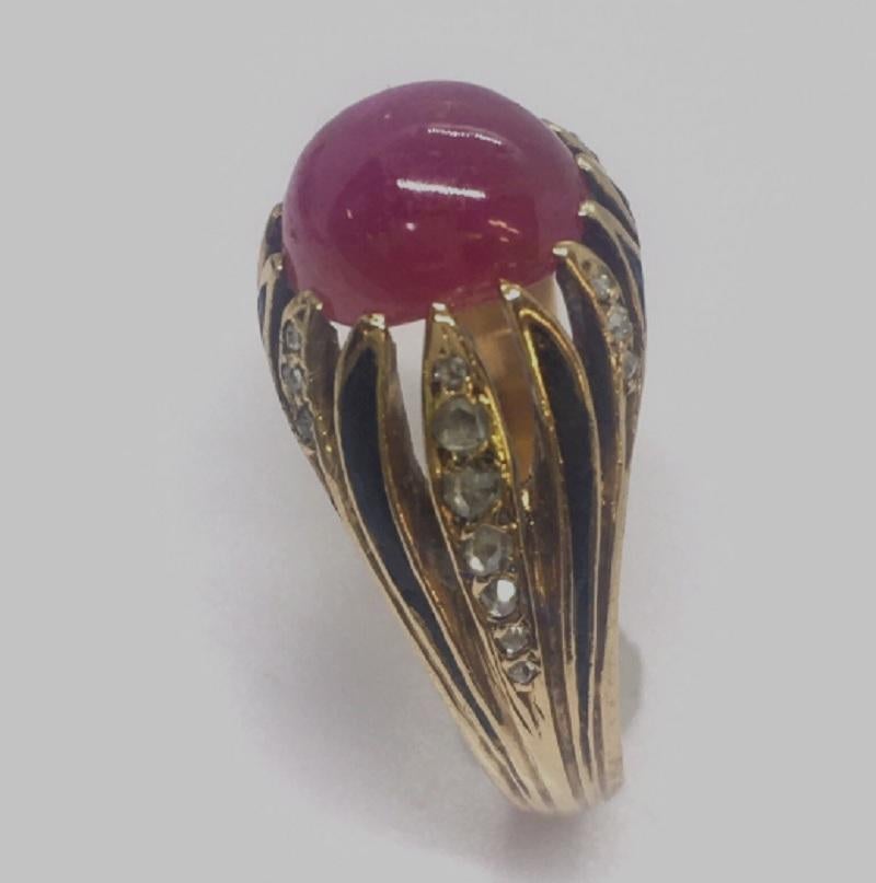 Victorian Circa 1880s Cabochon Natural Ruby Diamond Ring 14K Antique Yellow Gold

5.1 gram
9.0 mm by 7.3 mm by 5.8 mm deep, Cabochon Cut natural Ruby,  approximately 4.5 Carat
26 piece of Rose Cut Diamonds, no repairs, no replacements 
Finger size