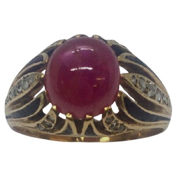 Bague victorienne des années 1880 en or jaune 14 carats avec rubis naturel cabochon et diamants en vente