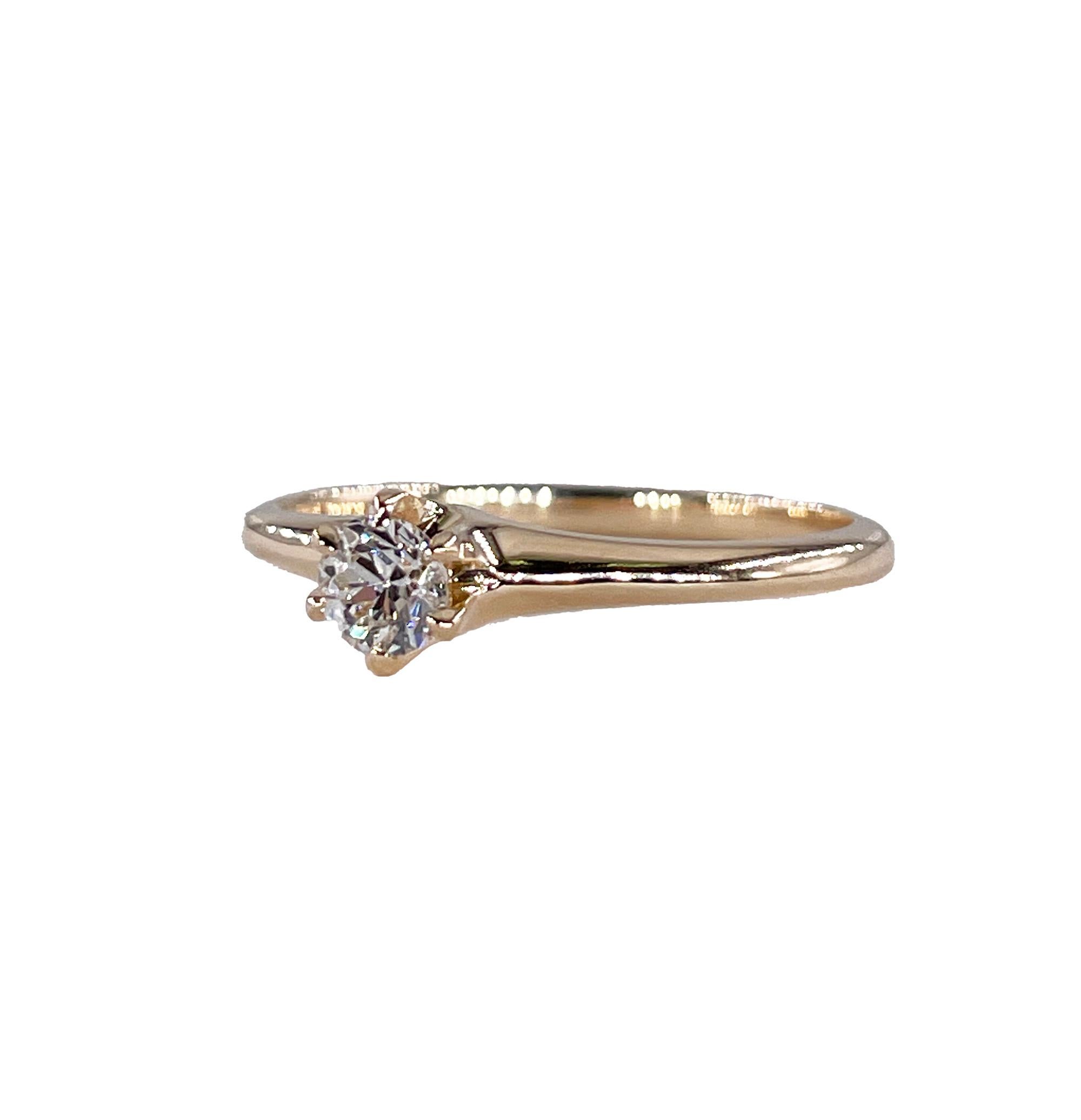 If you are looking for the perfect ring with lots of history to tell her how much you love her, look no further. This could be your ring! You'll love its color, the way it catches the light with lots of fire, the intricate design throughout this
