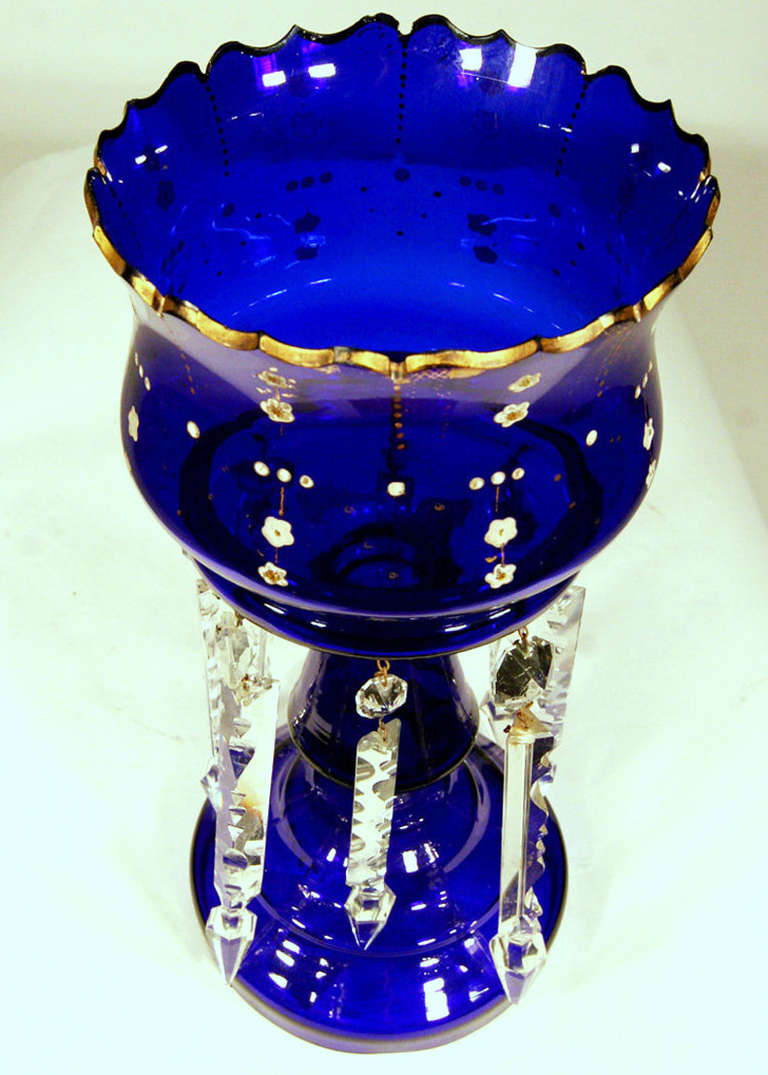Beautiful Victorian cobalt blue glass hand gilded luster vase with cut glass drops from the late Victorian era.