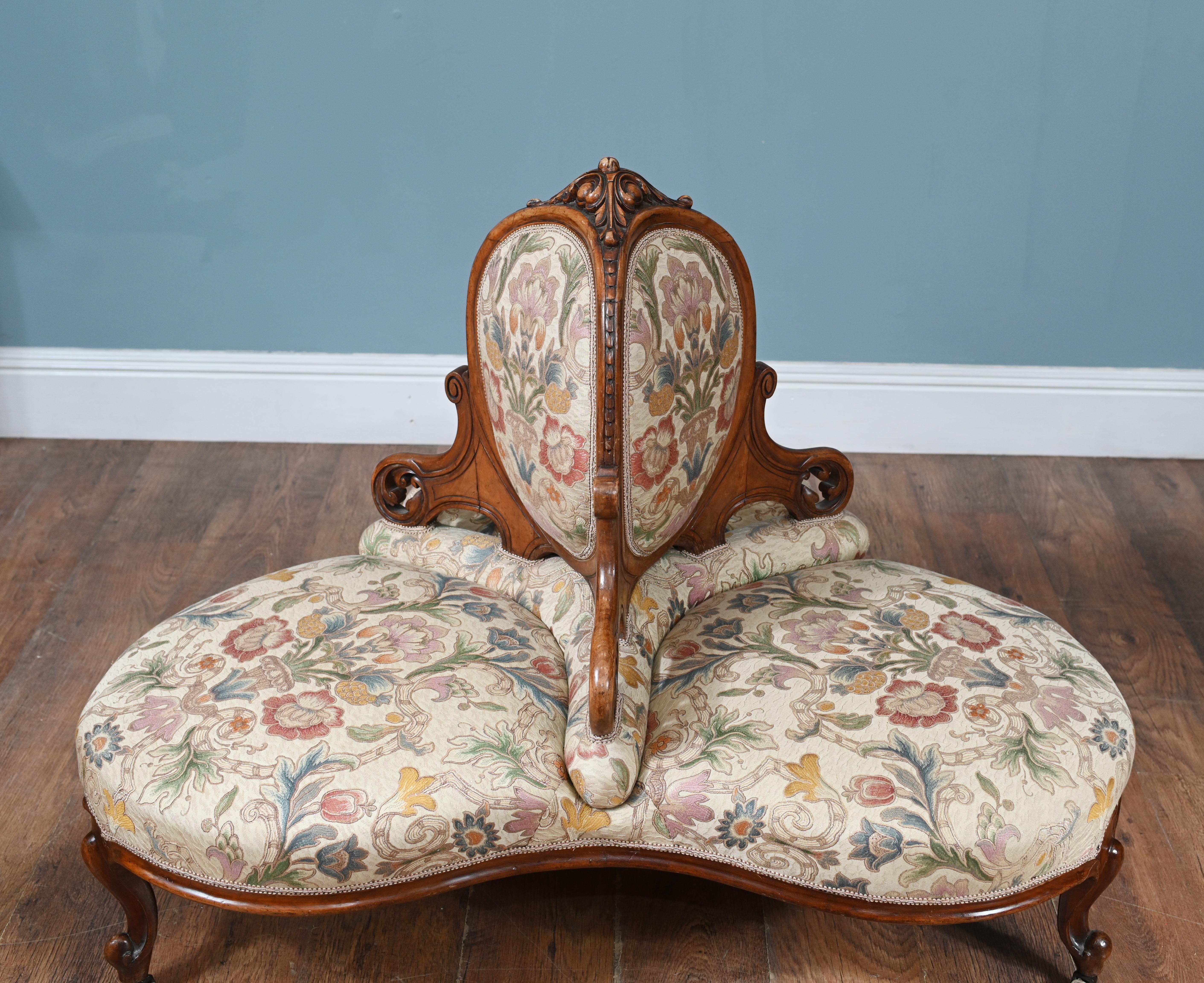 You are viewing a Victorian-era conversation seat - also known as a 