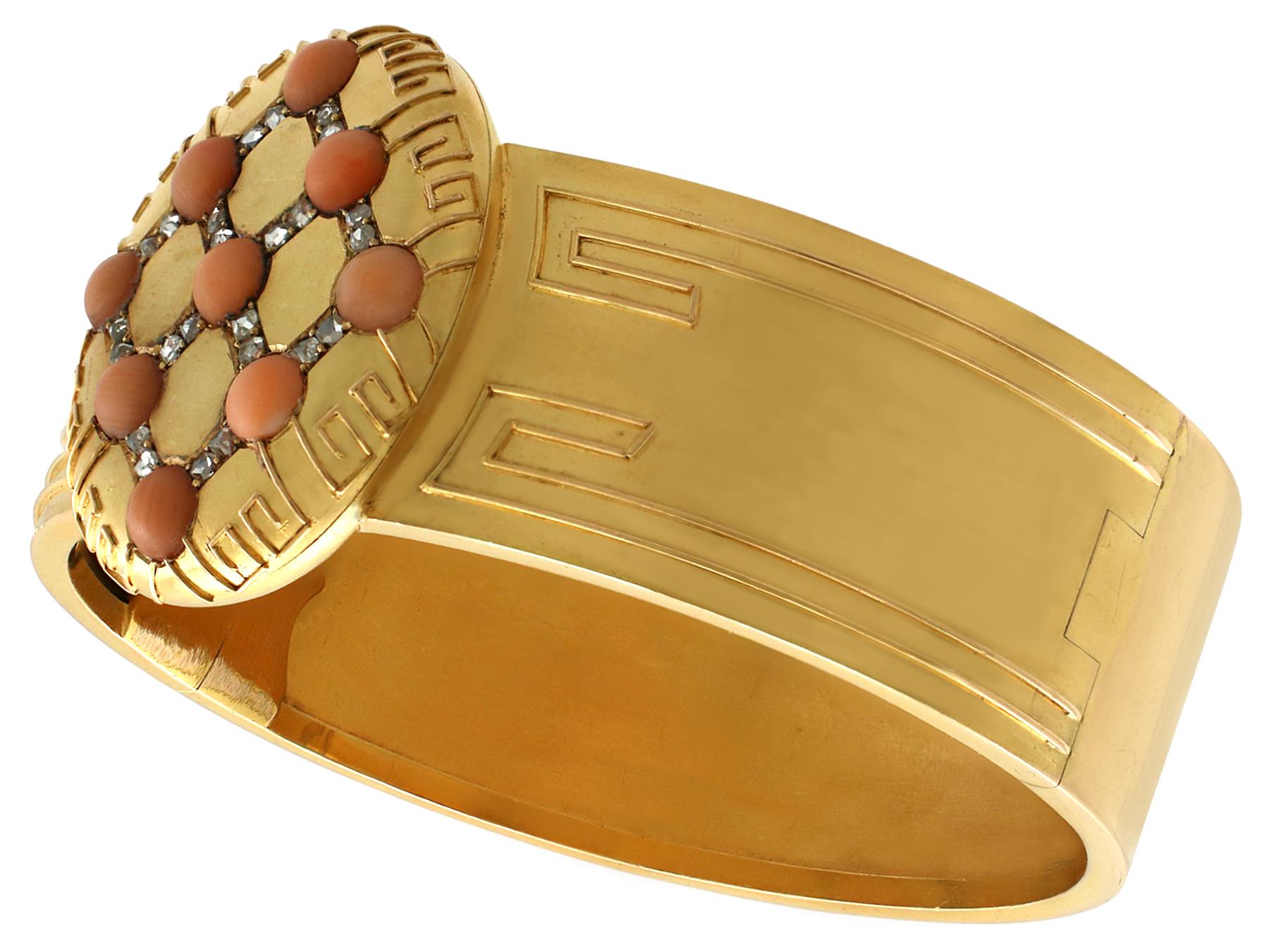 An exceptional and stunning antique Victorian natural coral and 0.33 carat diamond, 18 karat yellow gold bangle; part of our bangle and bracelet collection.

This exceptional Victorian coral bangle has been crafted in 18k yellow gold.

The central