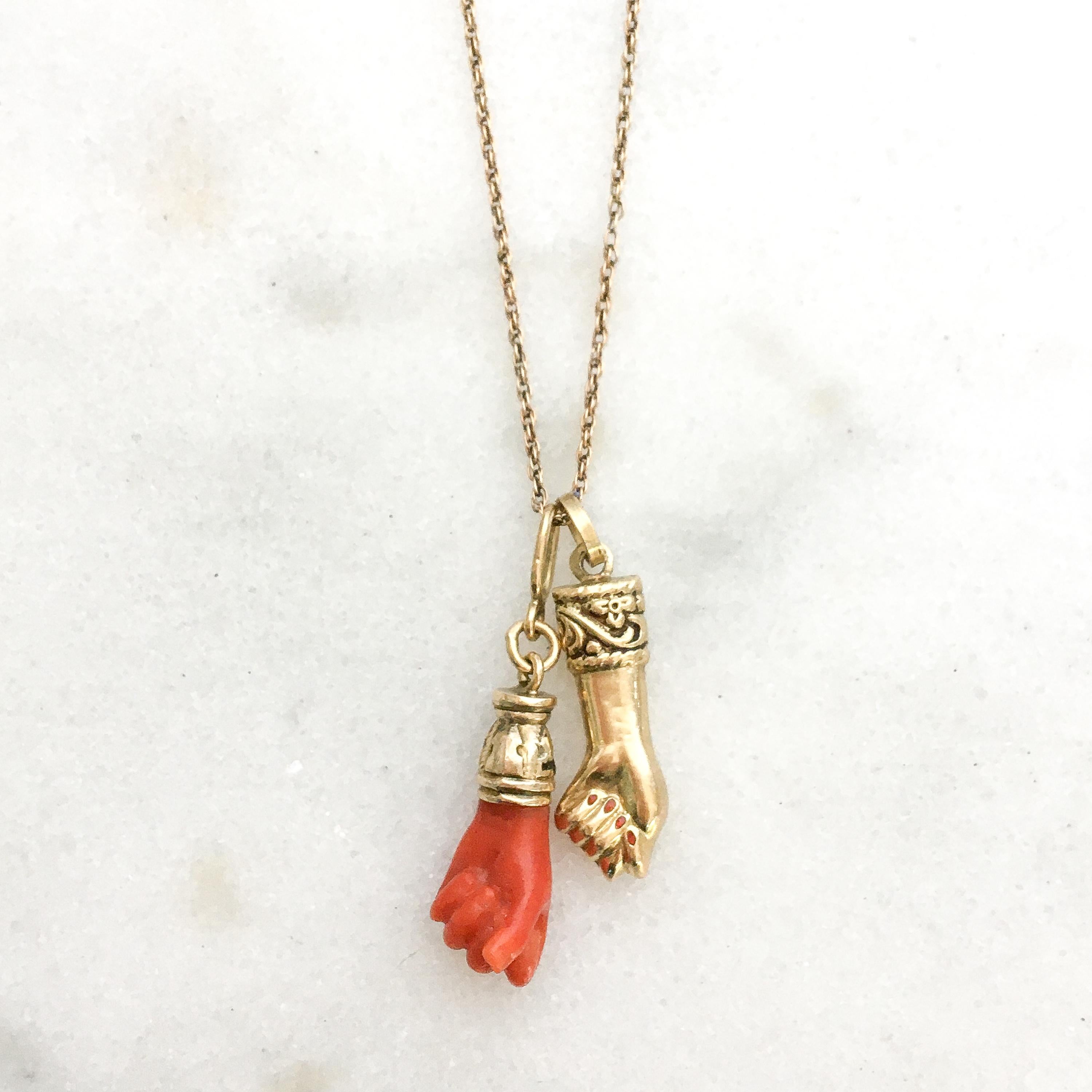 A beautiful figa hand charm made of coral and set with a 14 karat gold engraved bail. The hand is nicely detailed and the bail has beautiful engravings. The charm is great worn alone or layered with your other favorites. The charm comes without the