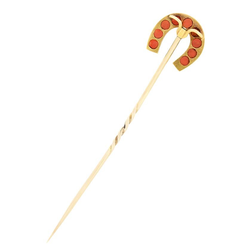 Nine coral gems are set around a horse shoe design in this wonderful Victorian pin brooch. Each beautiful coral has been set within 18 carat yellow gold, whilst the pin as been crafted in 9 carat yellow gold. This brooch would make the ideal