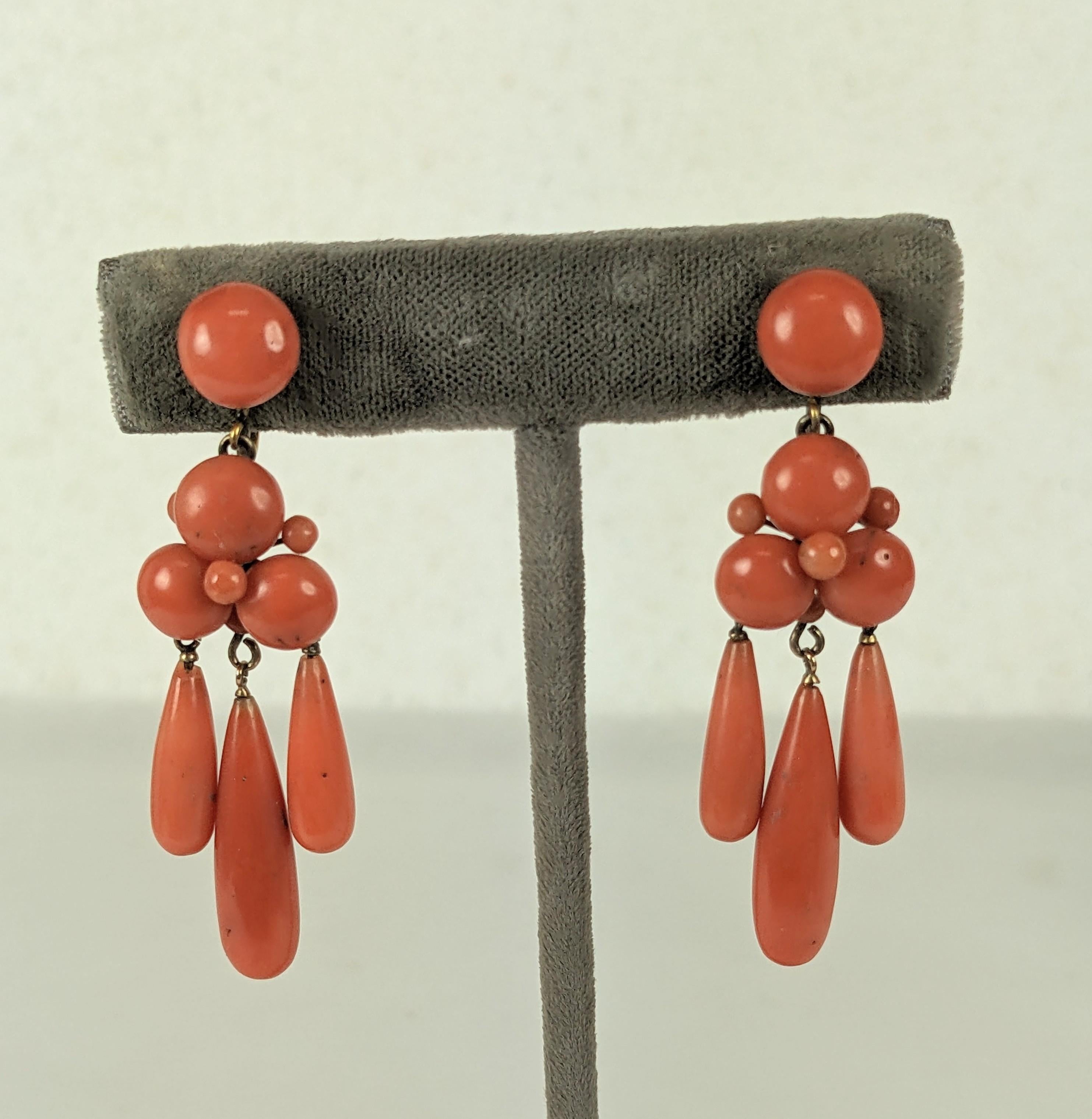 Lovely Victorian Coral Pendant Drop Earrings from the 19th Century with screw back fittings. Italian coral beads with original gold filled settings and 3 graduated coral pendant drops. Italy. 1880's. 2.25