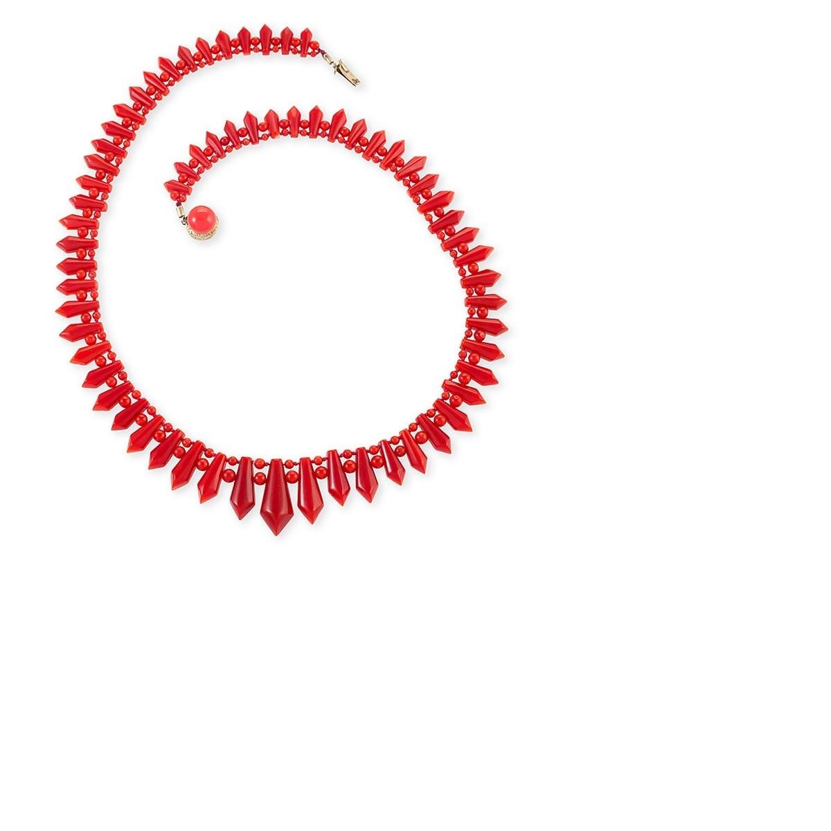 A natural, untreated oxblood color Sardinian coral necklace from the Mid-Victorian period.  Individual angular faceted graduated beads alternate with round beads to give the piece a freshly geometric look that suggests modern design, despite the