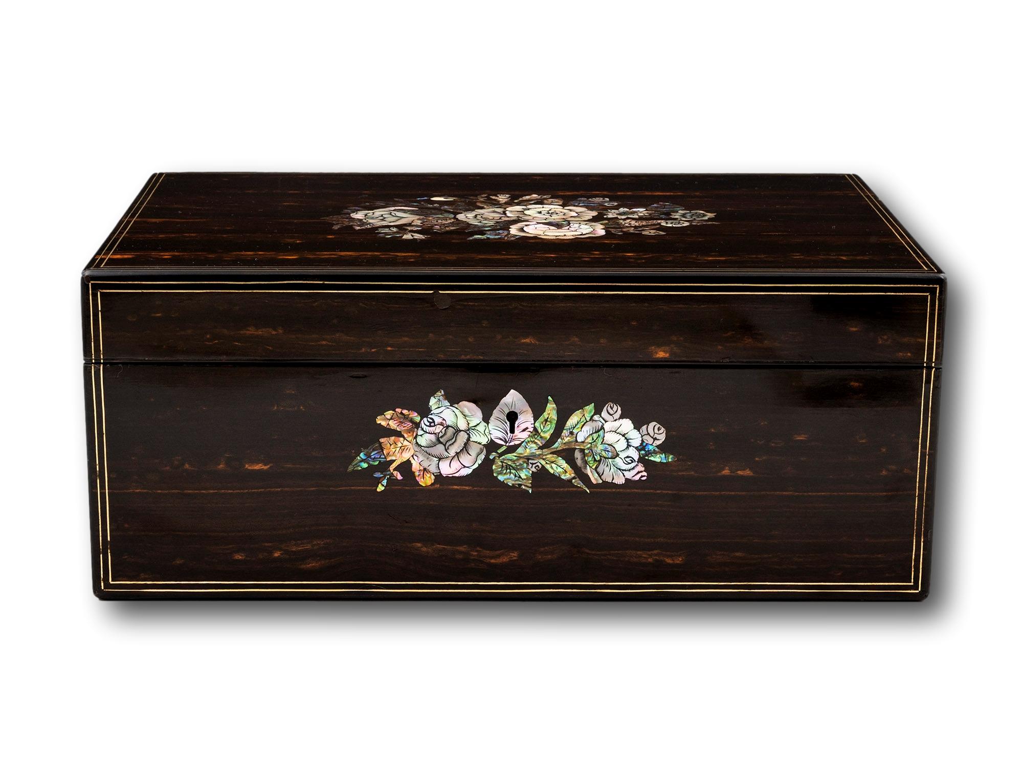 Dating to the Victorian Period Circa 1850

From our Writing Box collection, we are pleased to offer this Victorian Coromandel Writing Box. The Writing Box of rectangular shape veneered to the exterior in exotic Coromandel wood with double brass