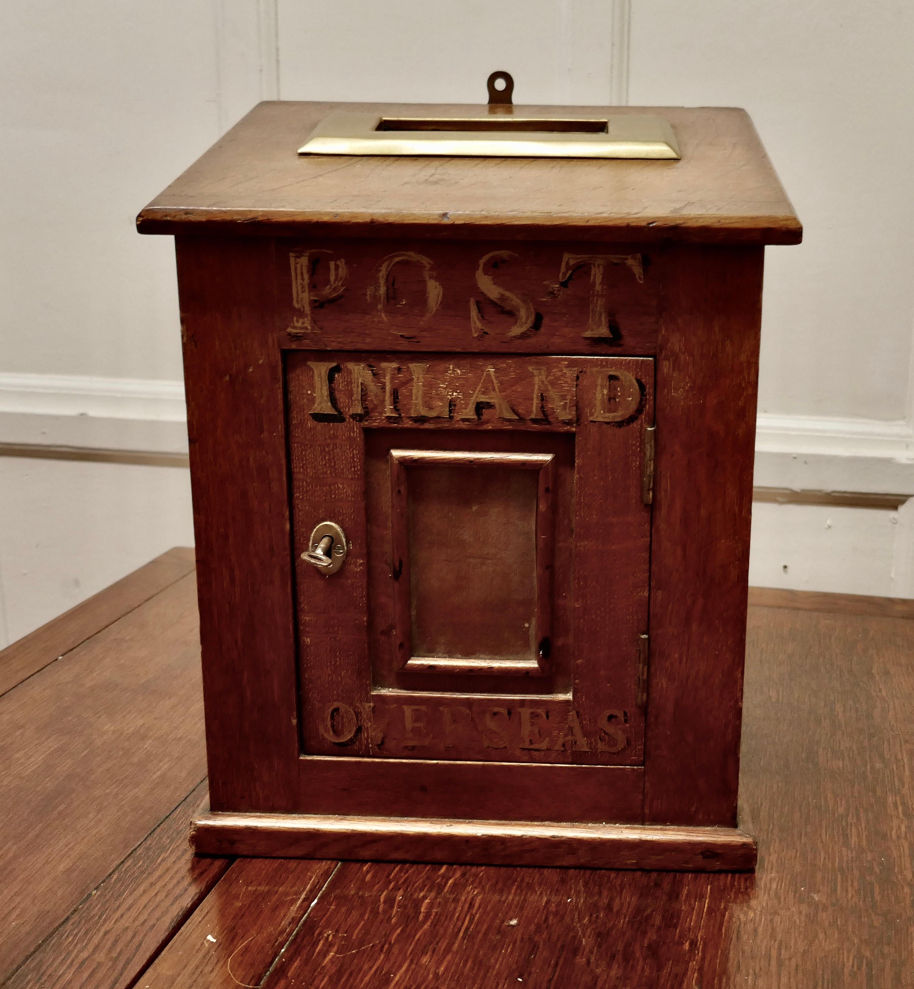 Victorian Country House Letter Box.

The Post Box is made in Golden Oak, it has an etched brass Letter Box at the top, with a small door marked Post, the box has its original working lock and key 
This is a very rare piece and would be a superb