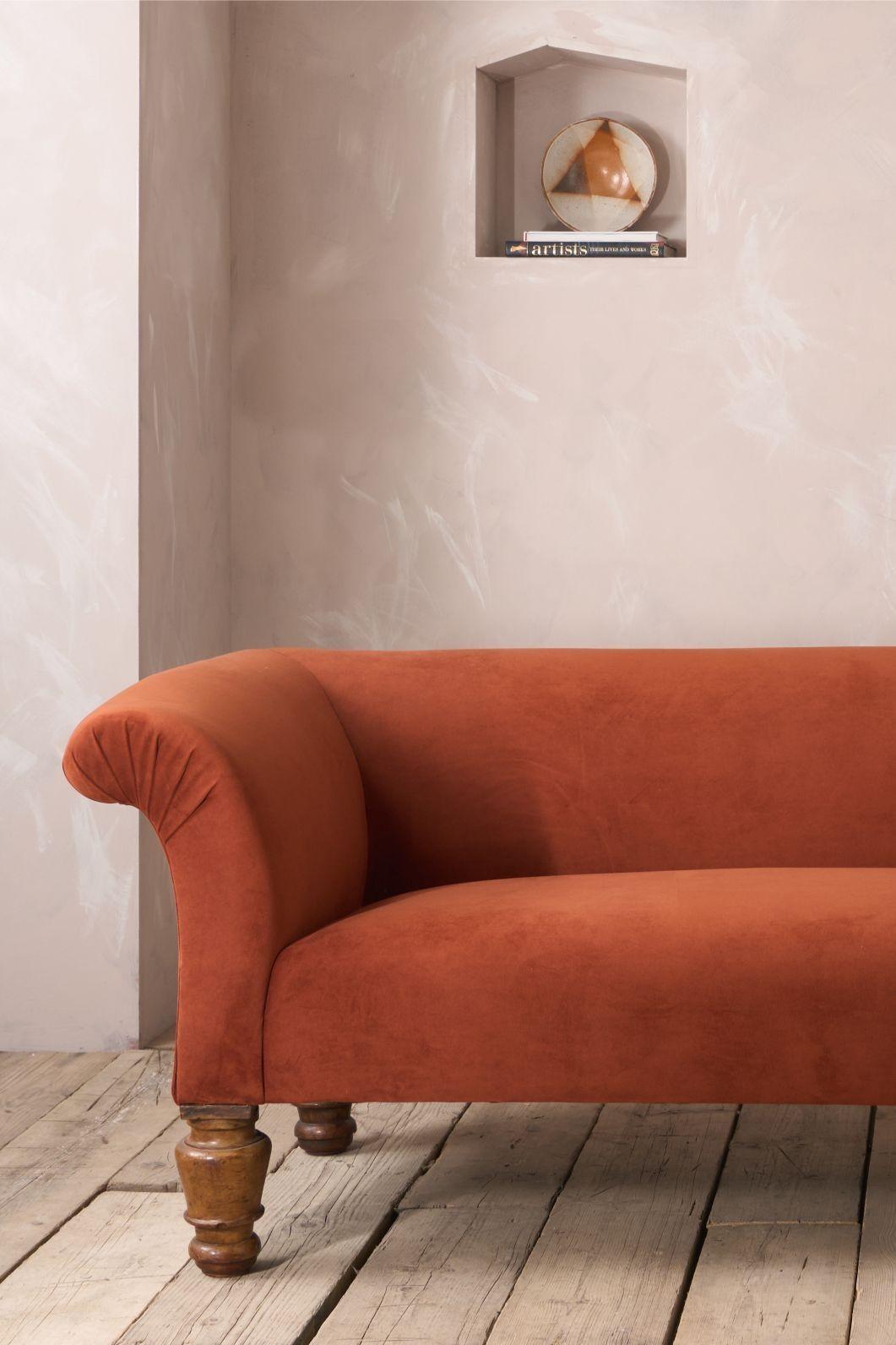This is a very impressive large scale Victorian country house sofa that we have upholstered in Rust coloured velvet. The scroll arm design is extremely elegant and will sit well in a huge number of interiors. The proportions make this very comfy and