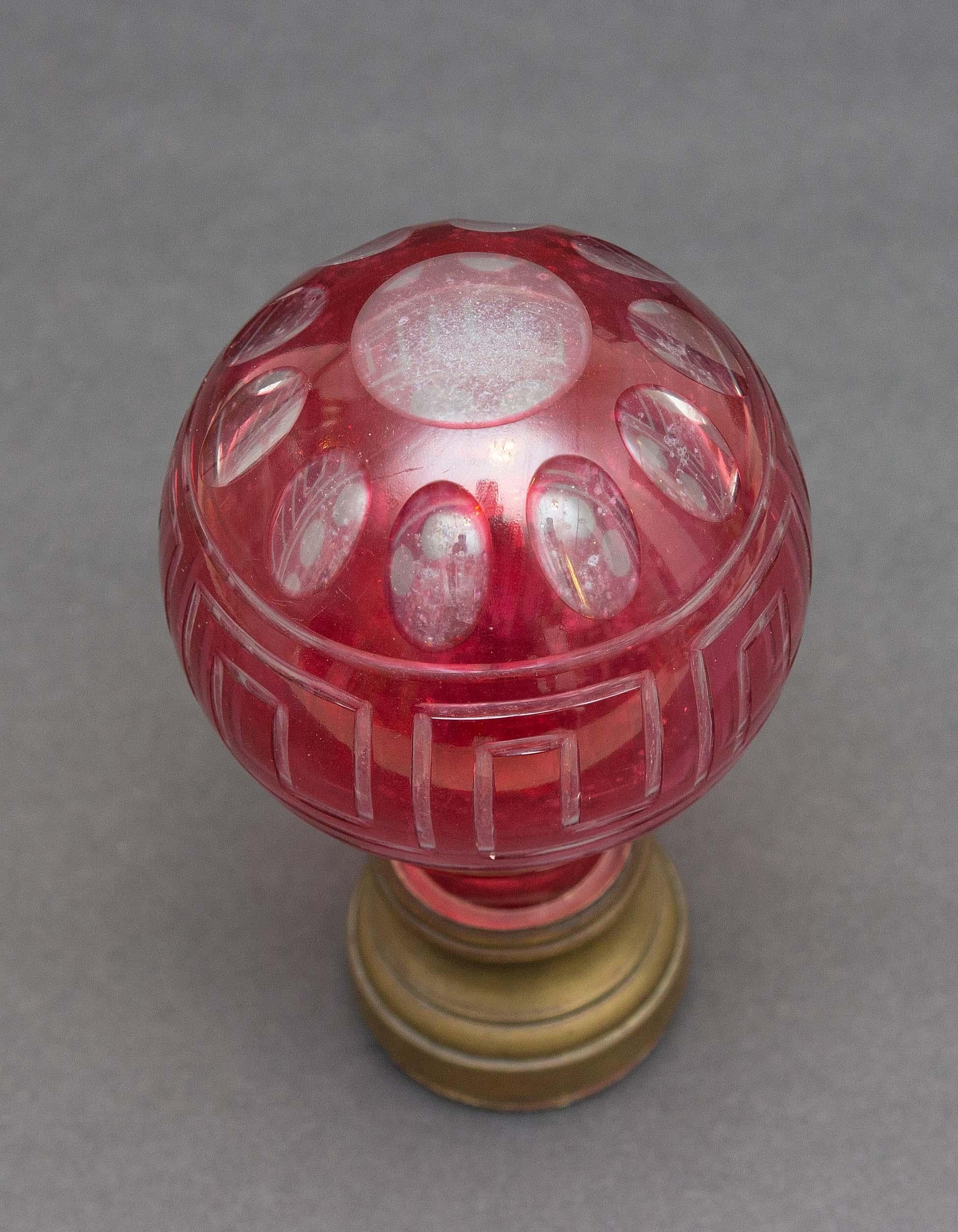 Victorian cranberry cut to clear glass newel post finial. From an estate collection.