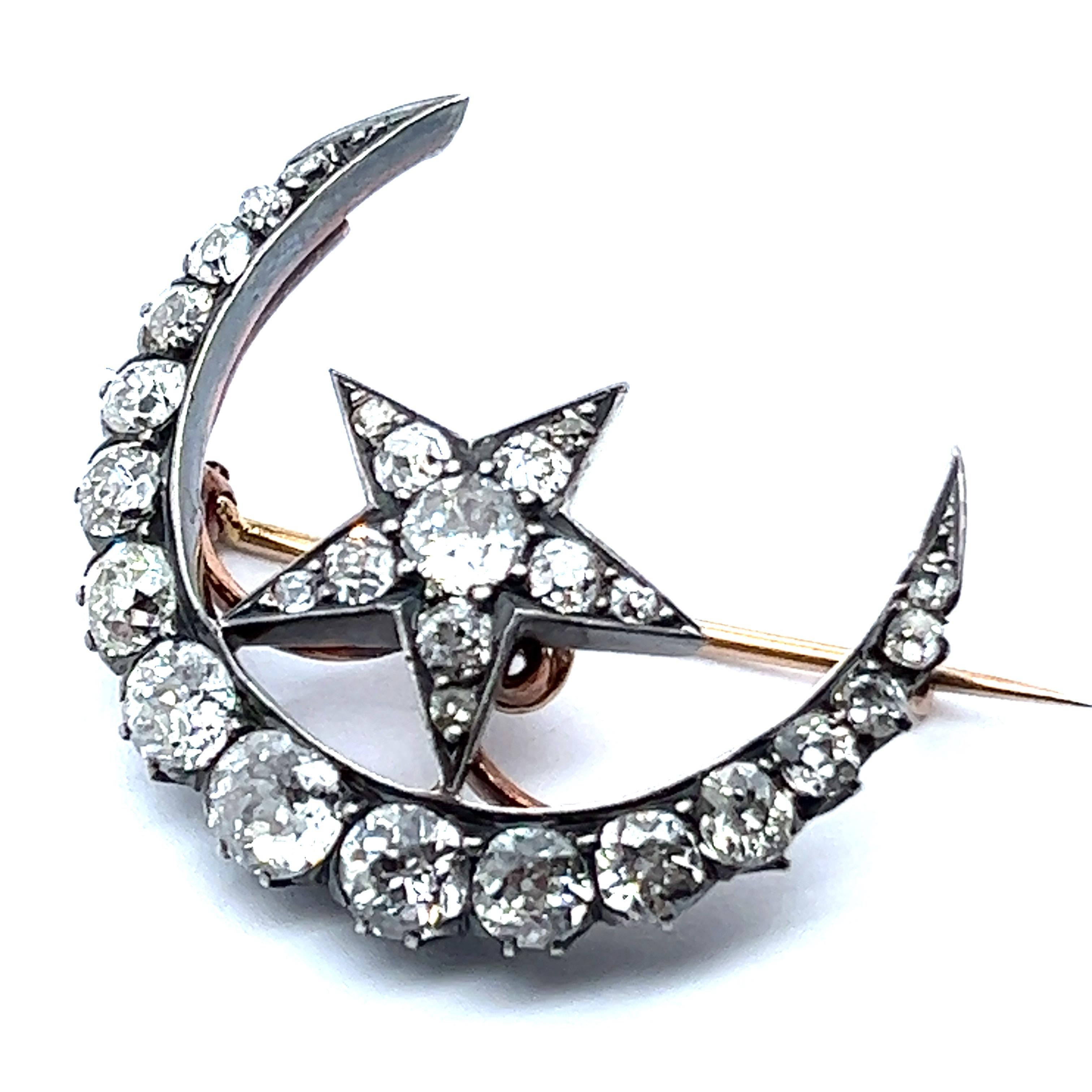 Introducing an exquisite crescent moon and star brooch adorned with an exceptional old cut diamond. This is a wonderful creation from the late 19th century, a time when these brooches were at the height of their popularity. Embodying the essence of