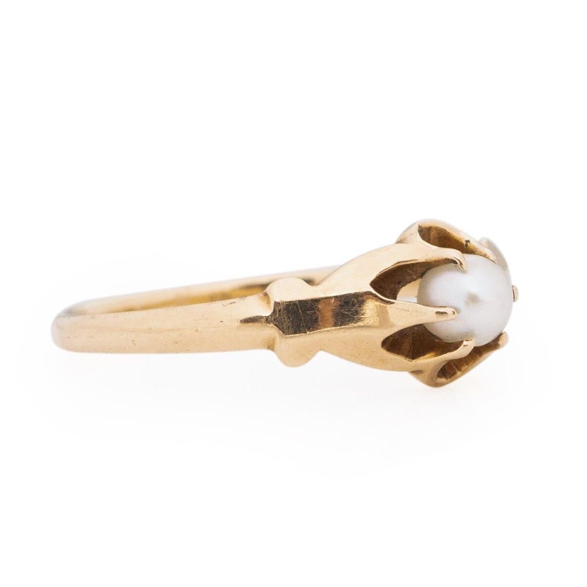 Here we have a cute solitaire pearl, belcher style from the Victorian era. This dainty piece is crafted in 14K yellow gold with very minimal detail, this allows the focus to be the pearl center. The small tapering details of the shank lead to the