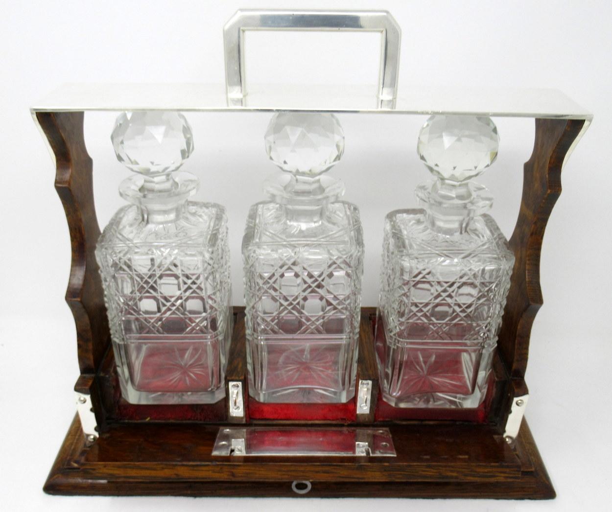 English Victorian Cut Crystal Oak Framed Tantalus Decanter Silver Mounted, 19th Century