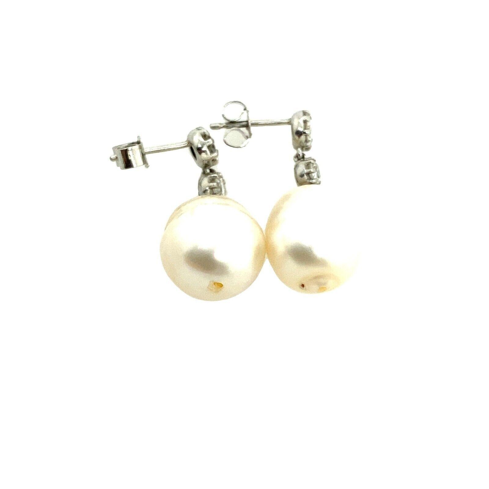 This is a pair of Victorian Cut Diamond drop earrings set with 0.65ct Diamonds and 2 cultured Pearls. This pair is a perfect choice for any occasion to wear as it is stylish and comfortable. It is crafted from Platinum with peg and butterfly
