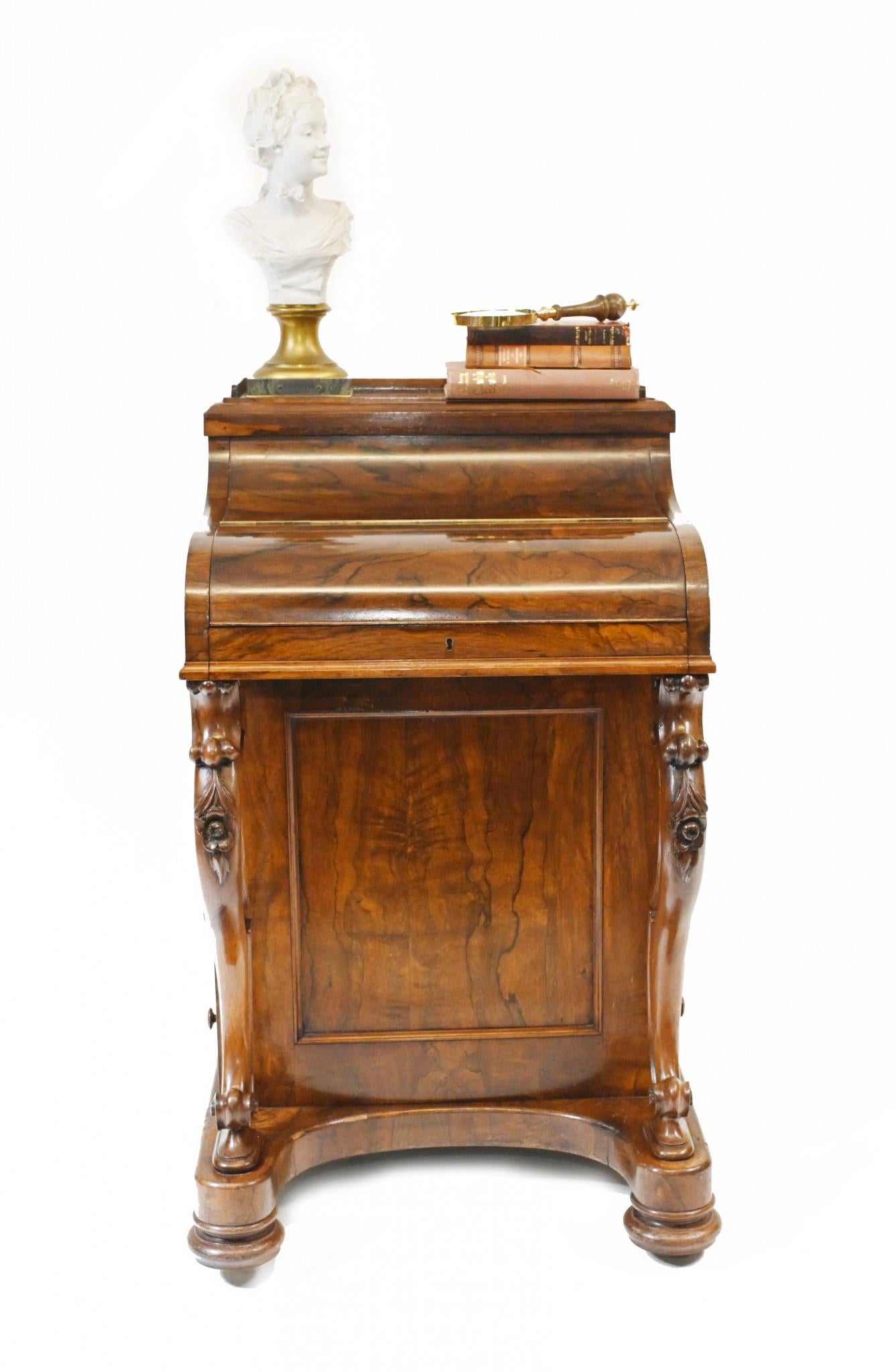 Elegant piano topped Victorian Davenport in rosewood
Features the all important pop up mechanism 
Activated by button in drawer to make the drawers and cubby holes pop up
Great little desk we date to circa 1860
Some of our items are in storage