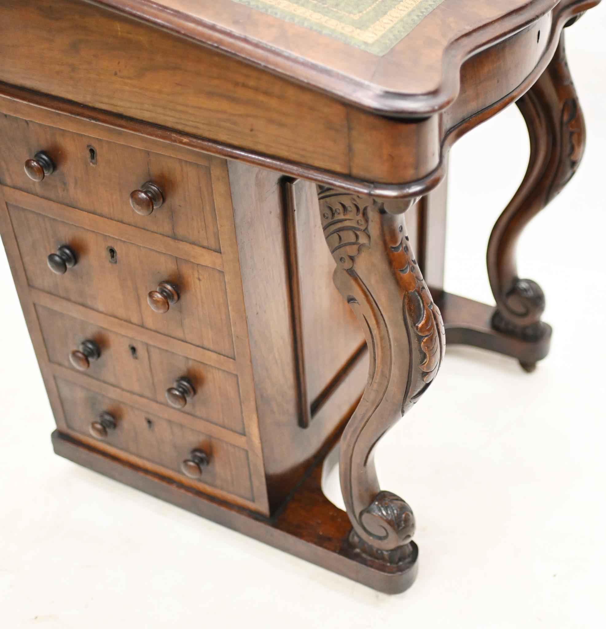 Gorgeous Victorian Davenport desk in walnut
Hand crafted from walnut and circa 1890
Sloped writing surface which opens up to reveal storage space
One side of desk features four drawers
The Davenport desk, popularized in the 19th century, is a